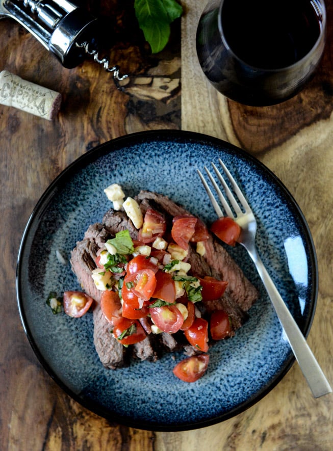 Red Wine Marinated Flank Steak with Cherry Tomato Caprese Salsa I howsweeteats.com