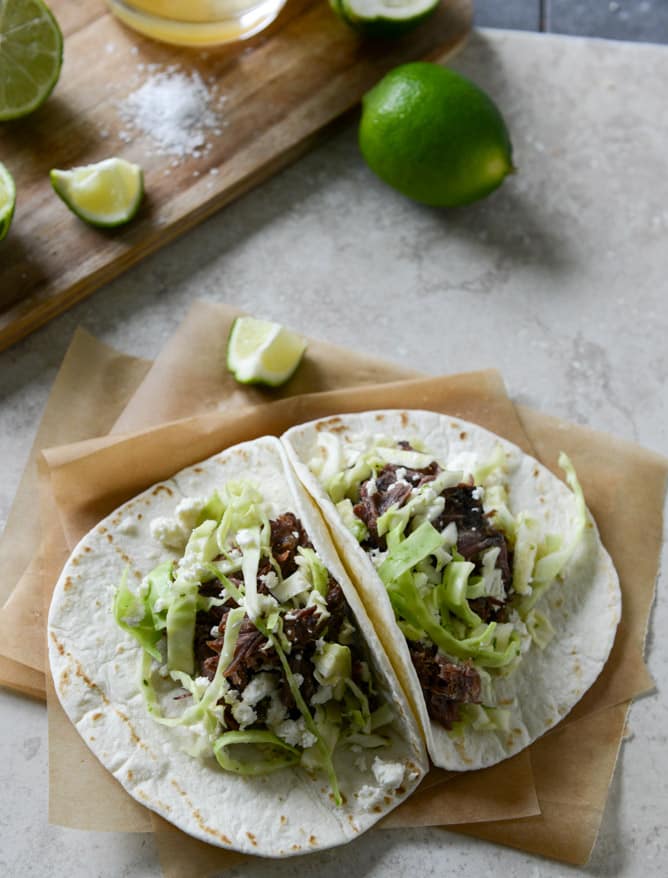 Crockpot Short Rib Tacos with Salted Lime Cabbage and Queso Fresco I howsweeteats.com