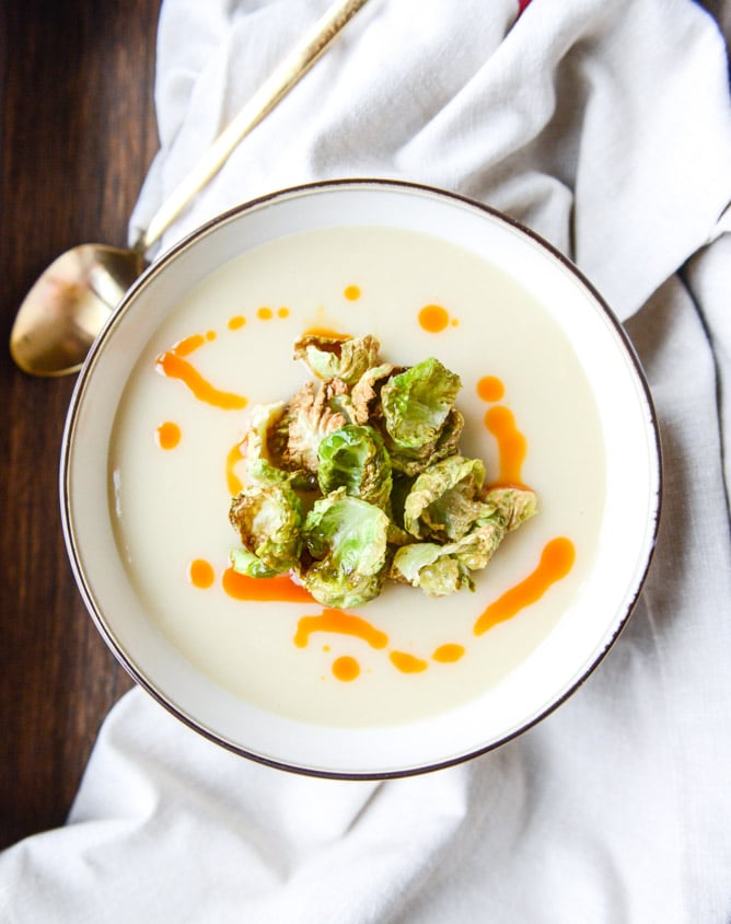 creamy roasted garlic potato soup with crispy brussels I howsweeteats.com