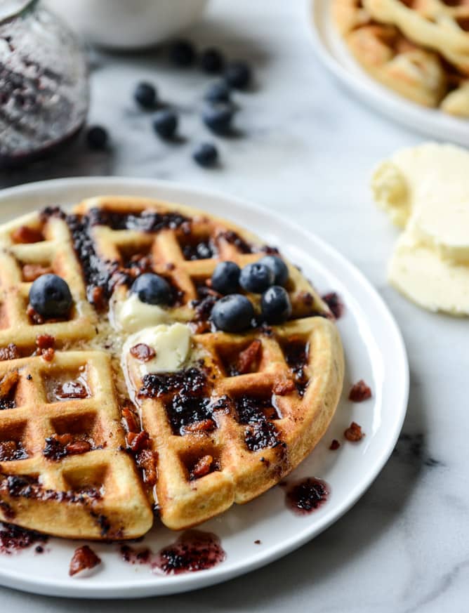 crispy bacon waffles with bourbon butter + blueberry syrup I howsweeteats.com