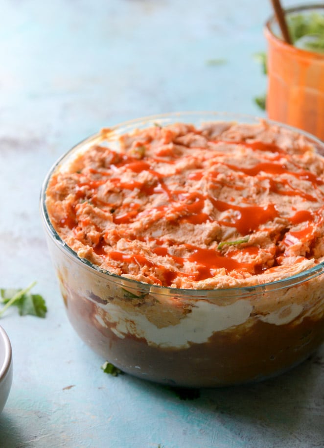 layered buffalo chicken dip I howsweeteats.com