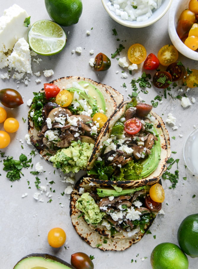 chipotle marinated kale and smoky mushroom tacos I howsweeteats.com