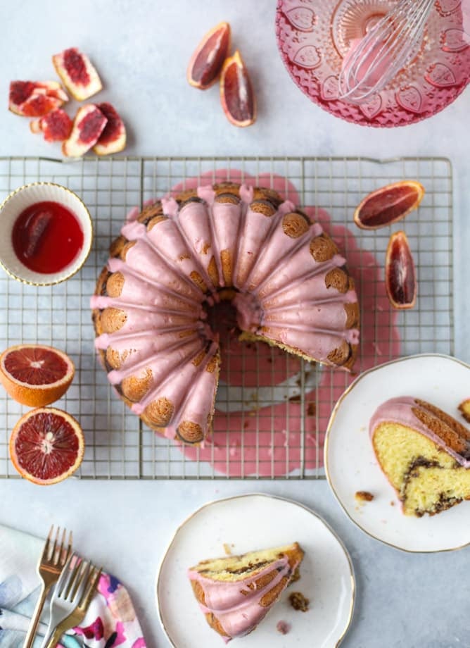 This blood orange coffee cake is made with greek yogurt and the most delicious blood orange glaze! Perfect for a winter breakfast or brunch! I howsweeteats.com #bloodorange #coffeecake