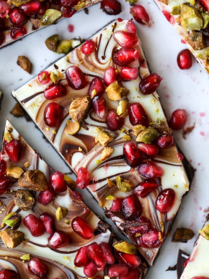 pomegranate pistachio swirled chocolate bark I howsweeteats.com #chocolate #bark #pomegranate #pistachio #christmas