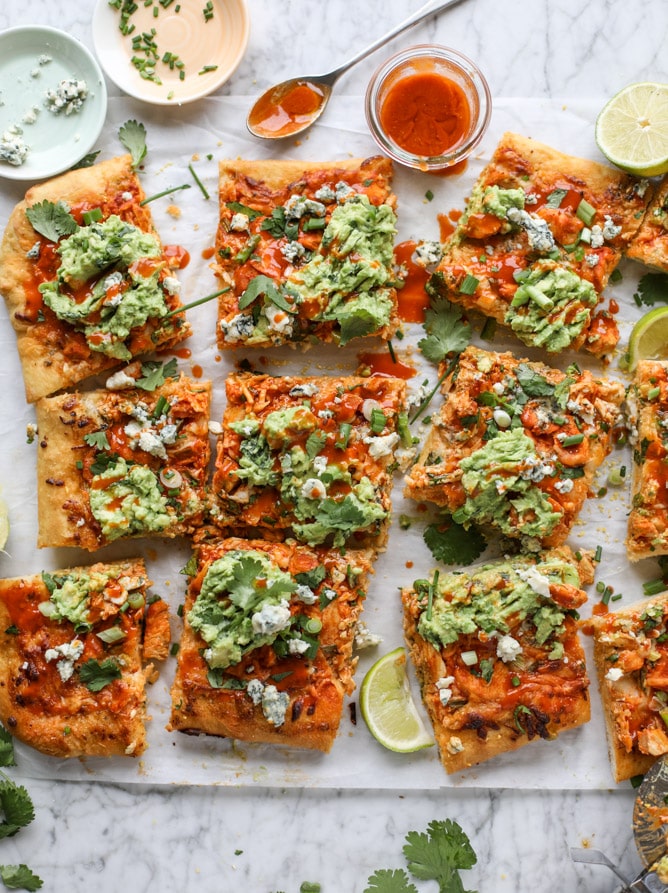 guacamole buffalo chicken pizza I howsweeteats.com #buffalochicken #pizza #guacamole #buffalowing