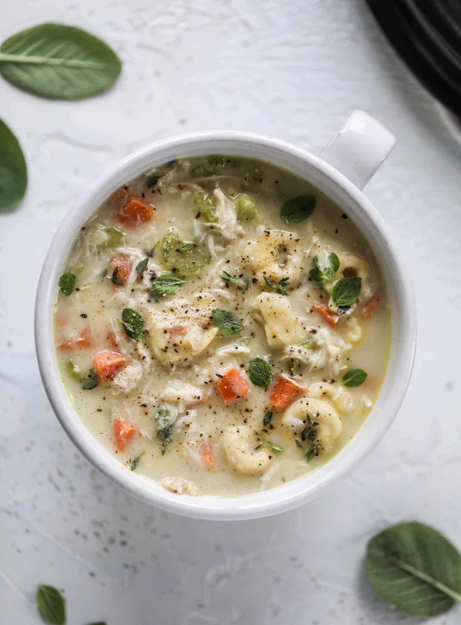 This creamy chicken tortellini soup is the perfect weeknight meal! It comes together quickly and is a great meal to use up a rotisserie chicken. It's satisfying and hearty, with tortellini replacing egg noodles for the pasta. Comfort food perfection! I howsweeteats.com #chicken #soup