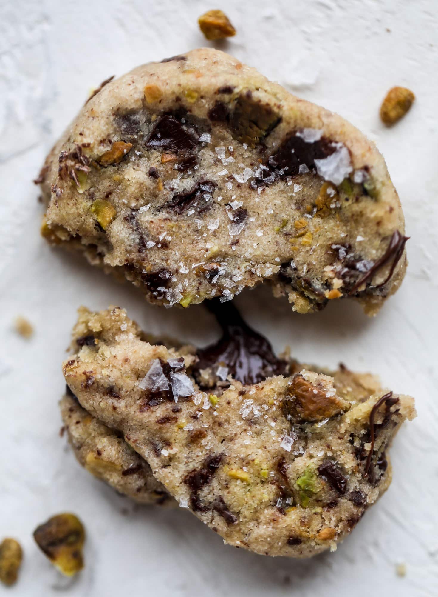This chocolate pistachio shortbread recipe is the perfect combo of sweet and salty in a crunchy cookie! Melty, rich dark chocolate comes together with roasted, salted pistachios to make a delicious crunchy cookie! I howsweeteats.com #chocolate #pistachio #shortbread