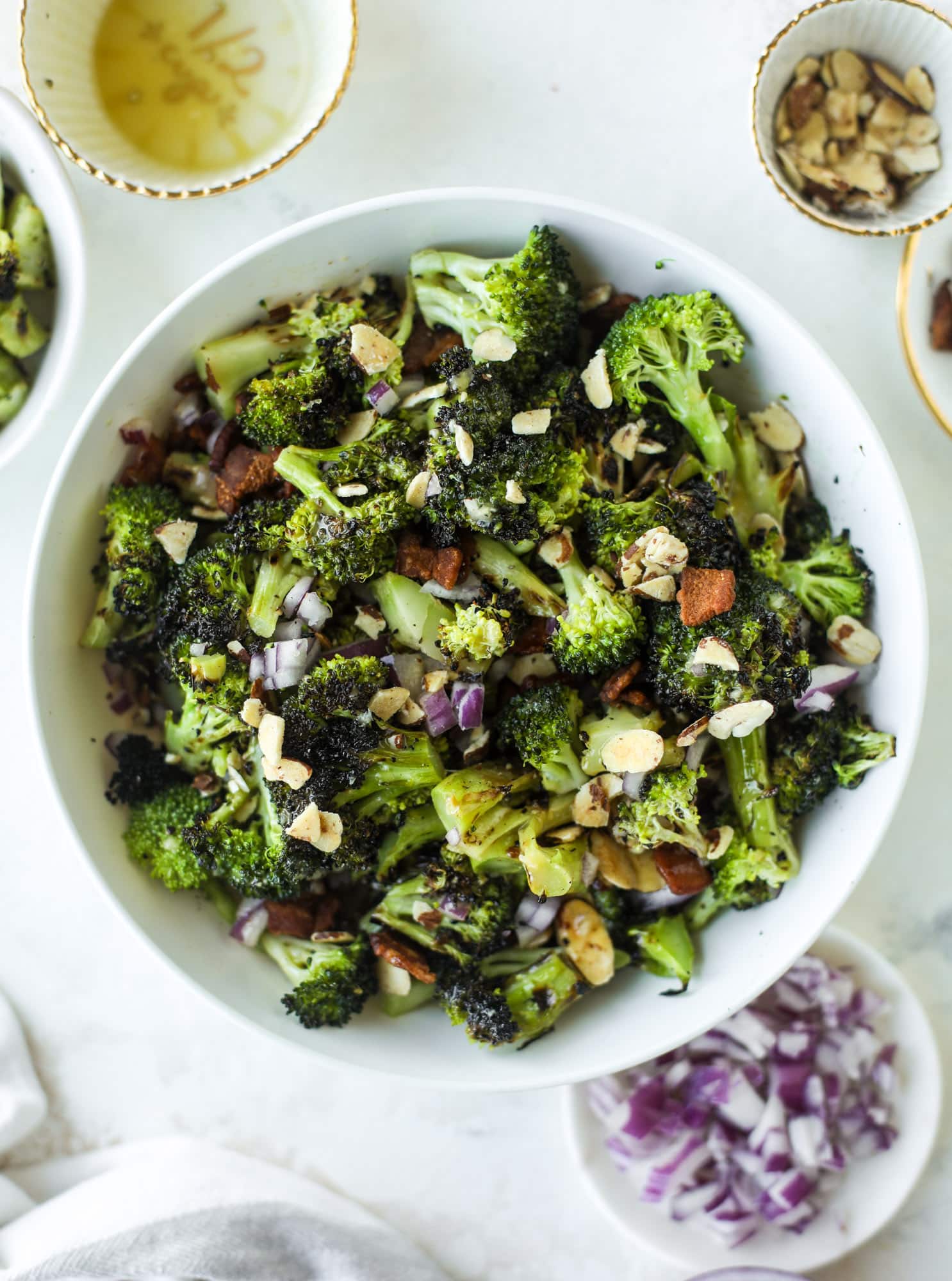 My favorite broccoli salad is here! This broccoli crunch salad is full of grilled broccoli, sliced almonds, diced scallions and crunchy bacon. It's so good!