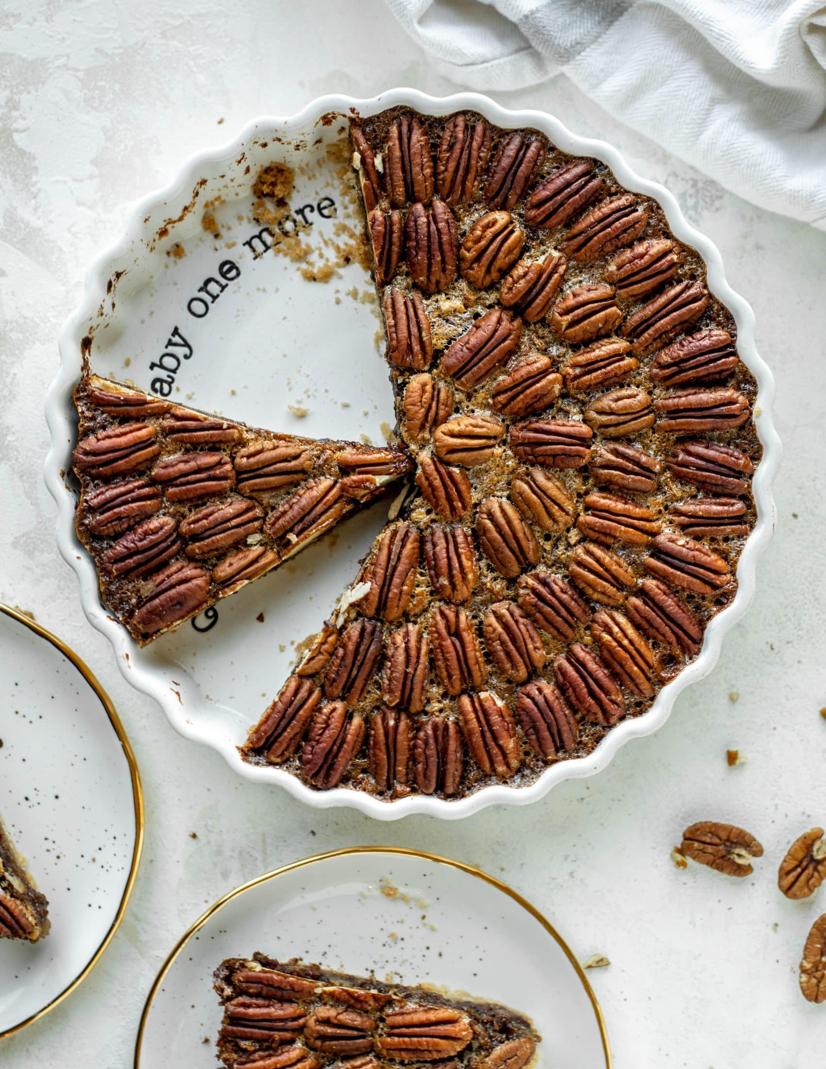 This chocolate pecan tart is the best dessert ever. Chocolate fudge and gooey pecan pie in a shortbread crust - everyone goes crazy!