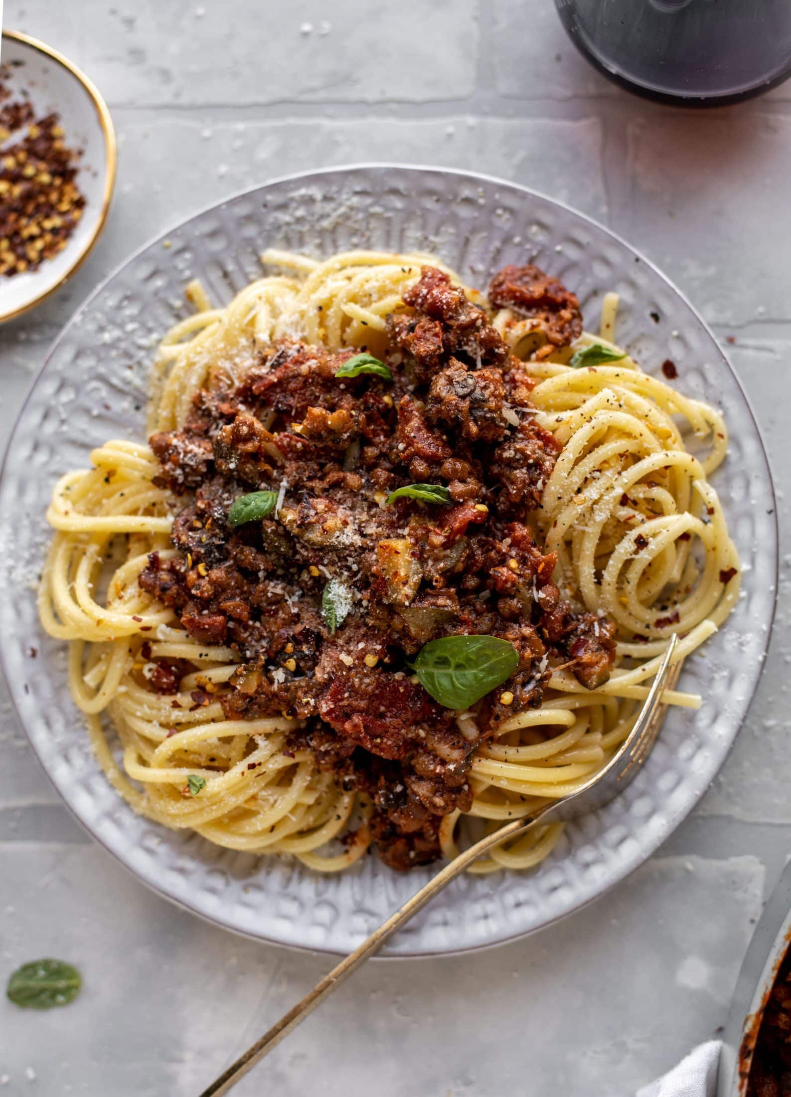 This lentil bolognese is incredible! Super hearty, loaded with vegetables, saucy, rich and decadent. You won't even miss the meat!