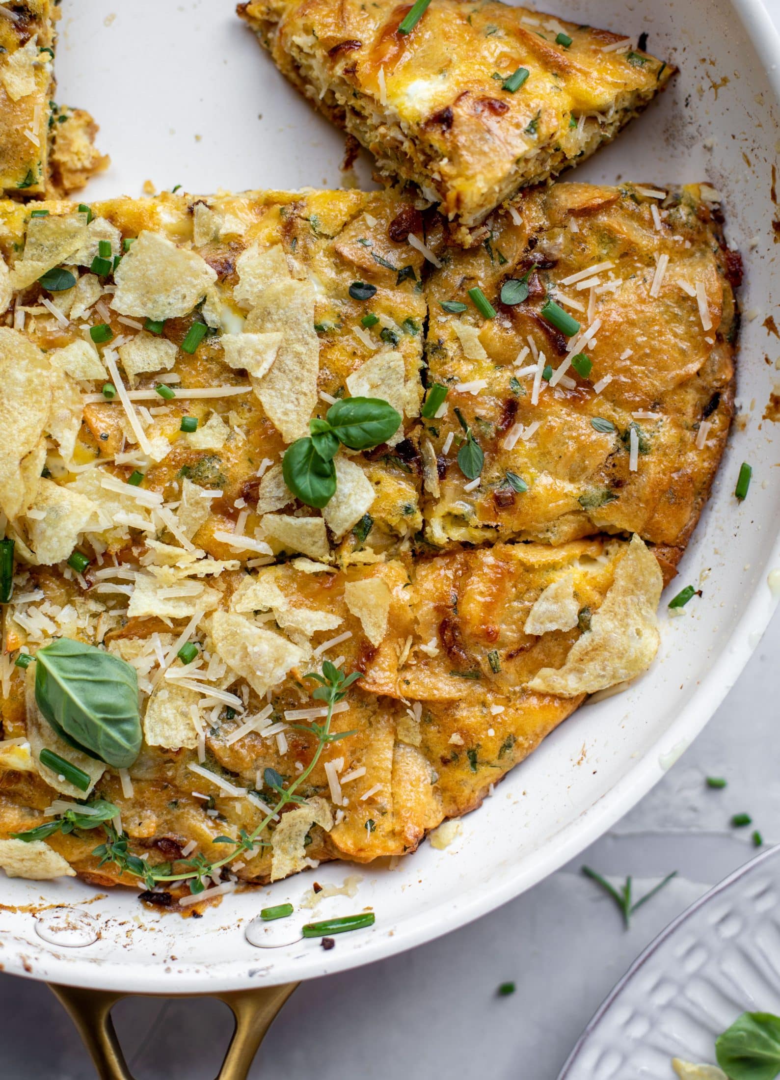 sliced potato chip frittata with fresh herbs