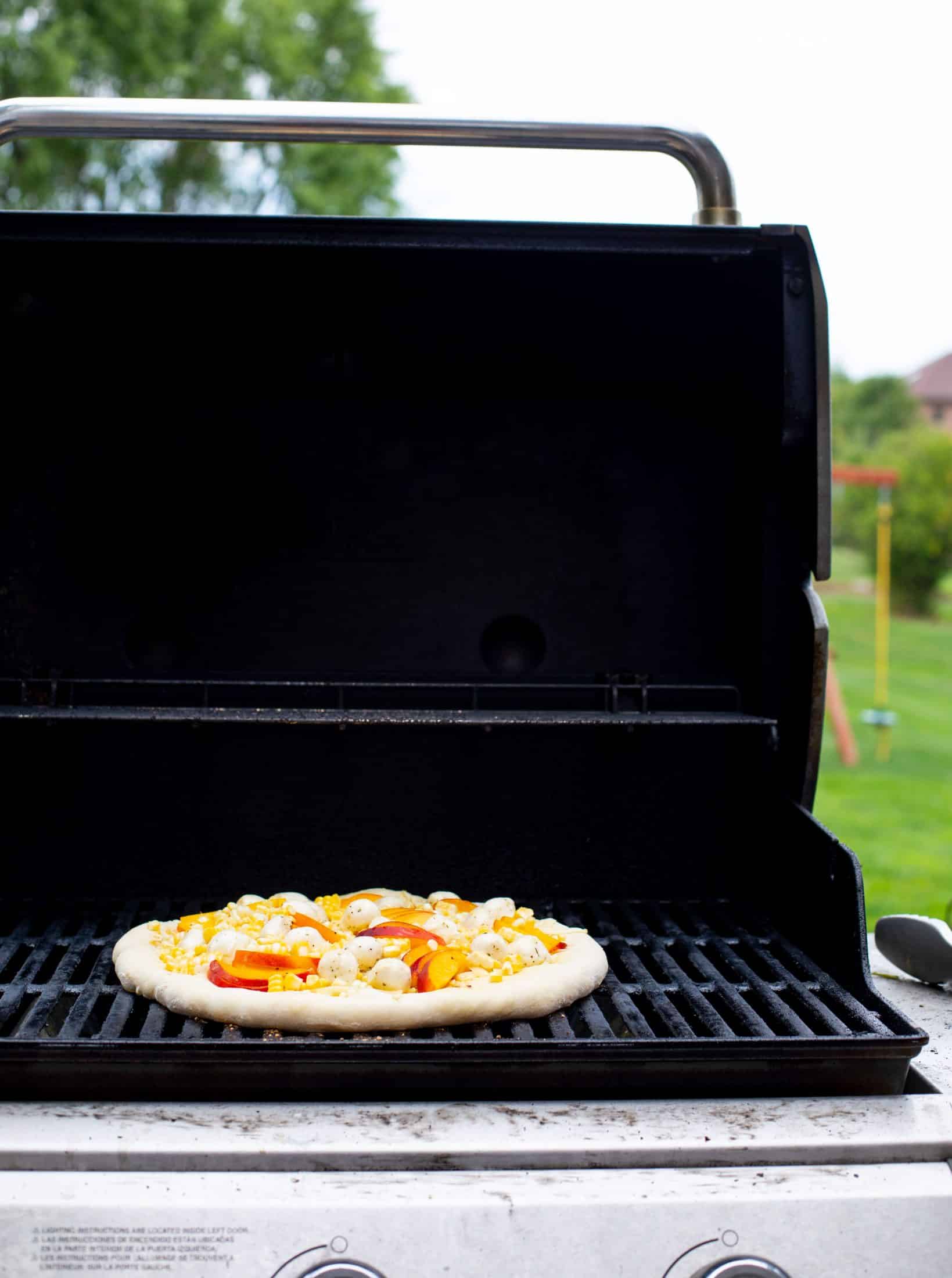 corn peach pizza on the grill