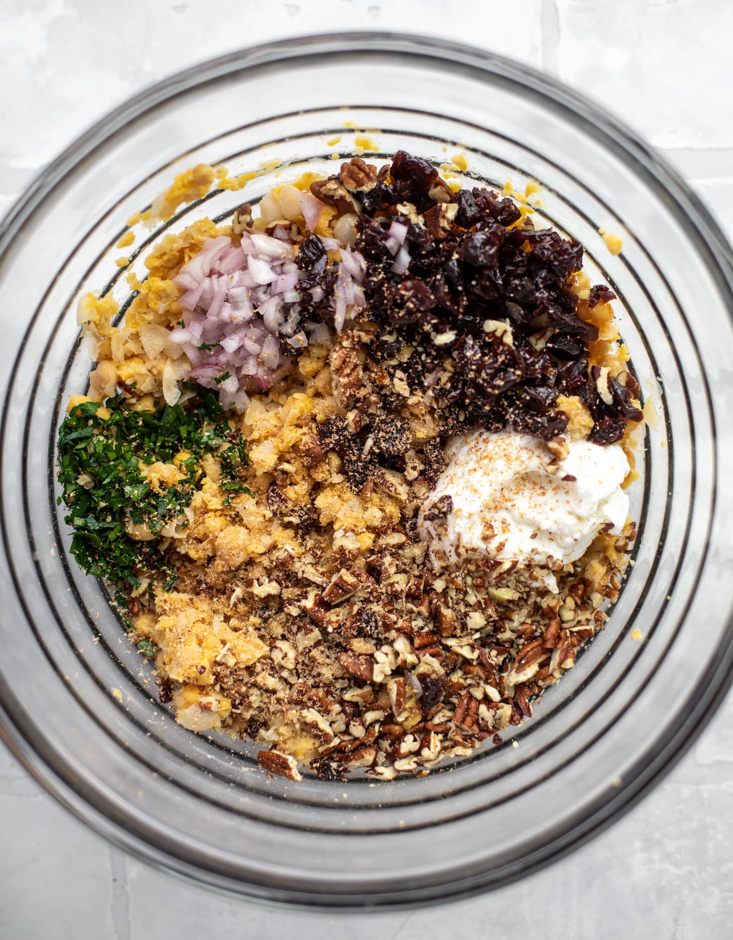 smashed chickpeas with dried cherries, shallots, herbs, pecans, yogurt and nutmeg