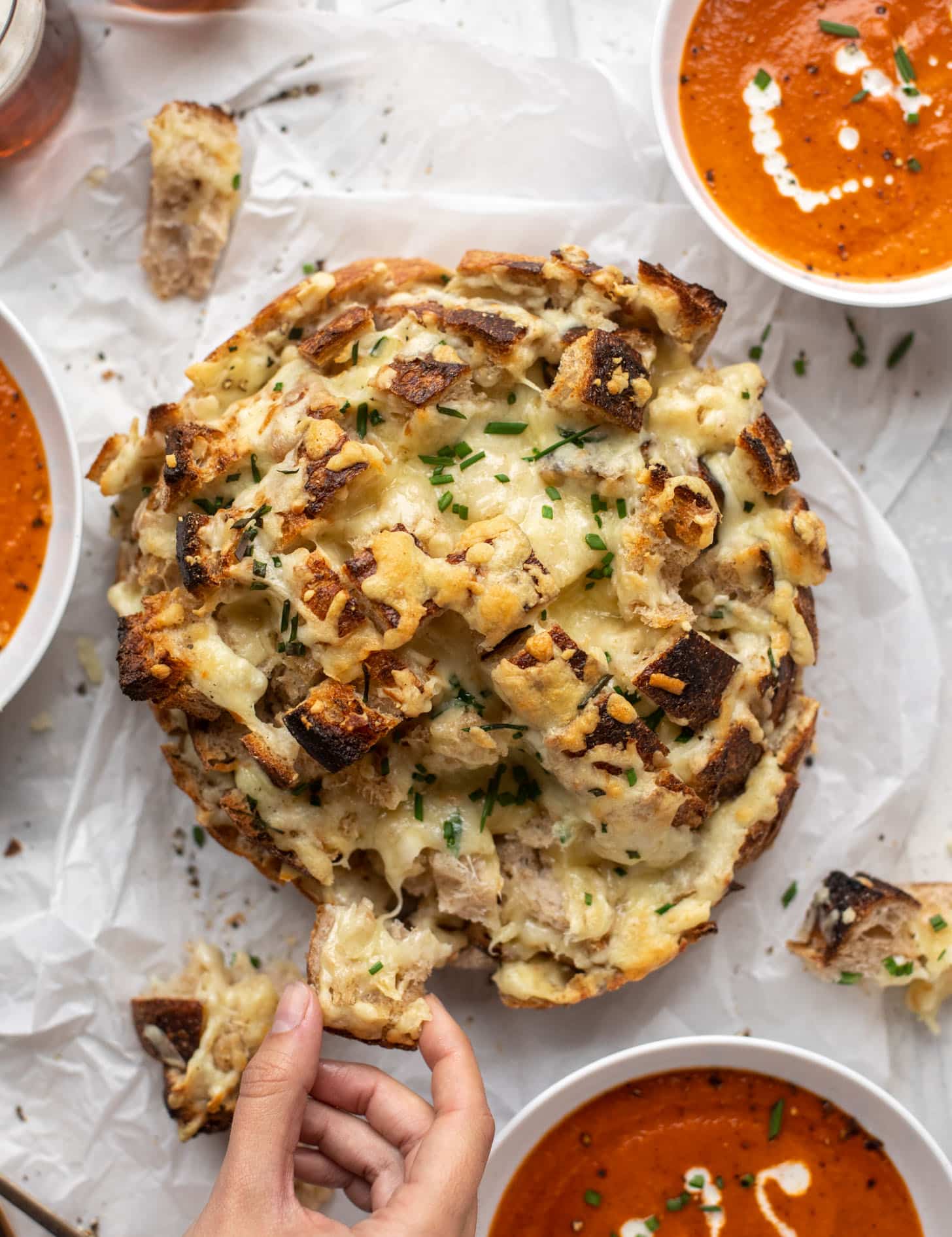 chipotle tomato soup with smoked cheddar pull apart bread