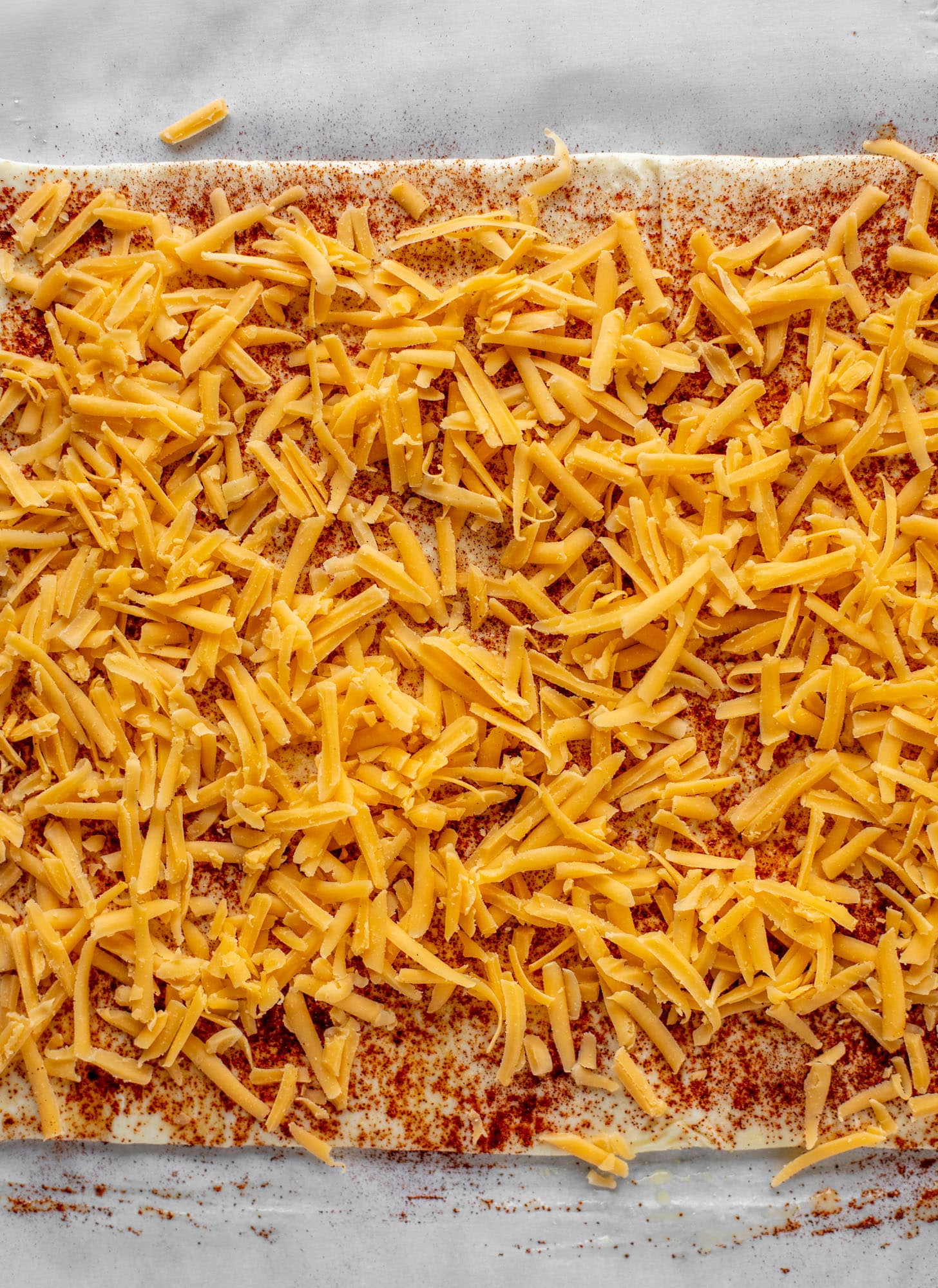 chili powder and cheddar on puff pastry