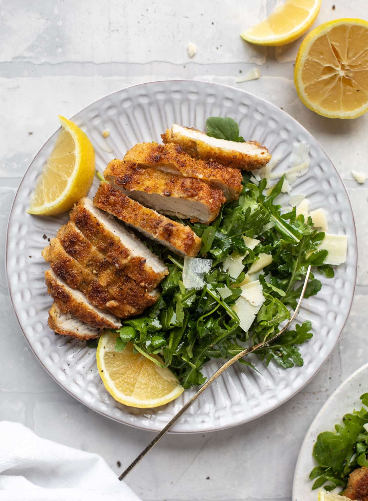 pork milanese with lemon arugula greens