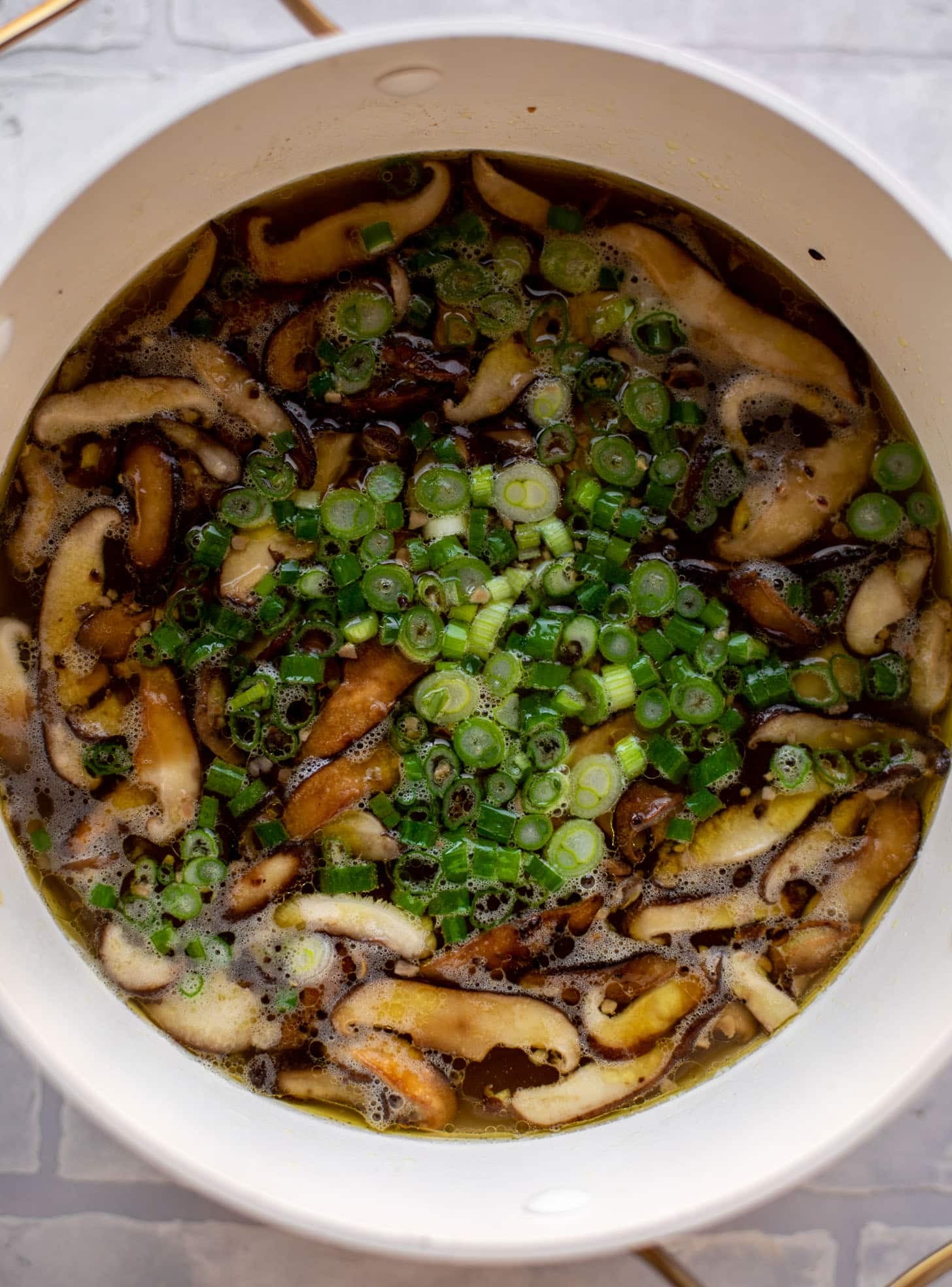 broth with shiitake mushrooms and scallions