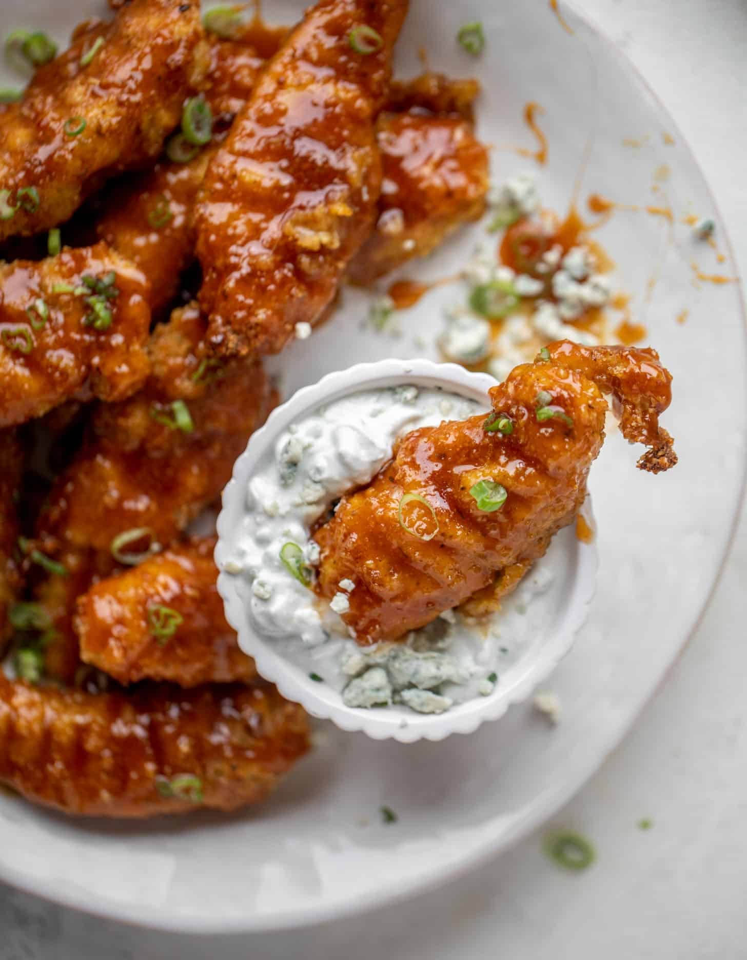 sticky chicken fingers with yogurt blue cheese sauce