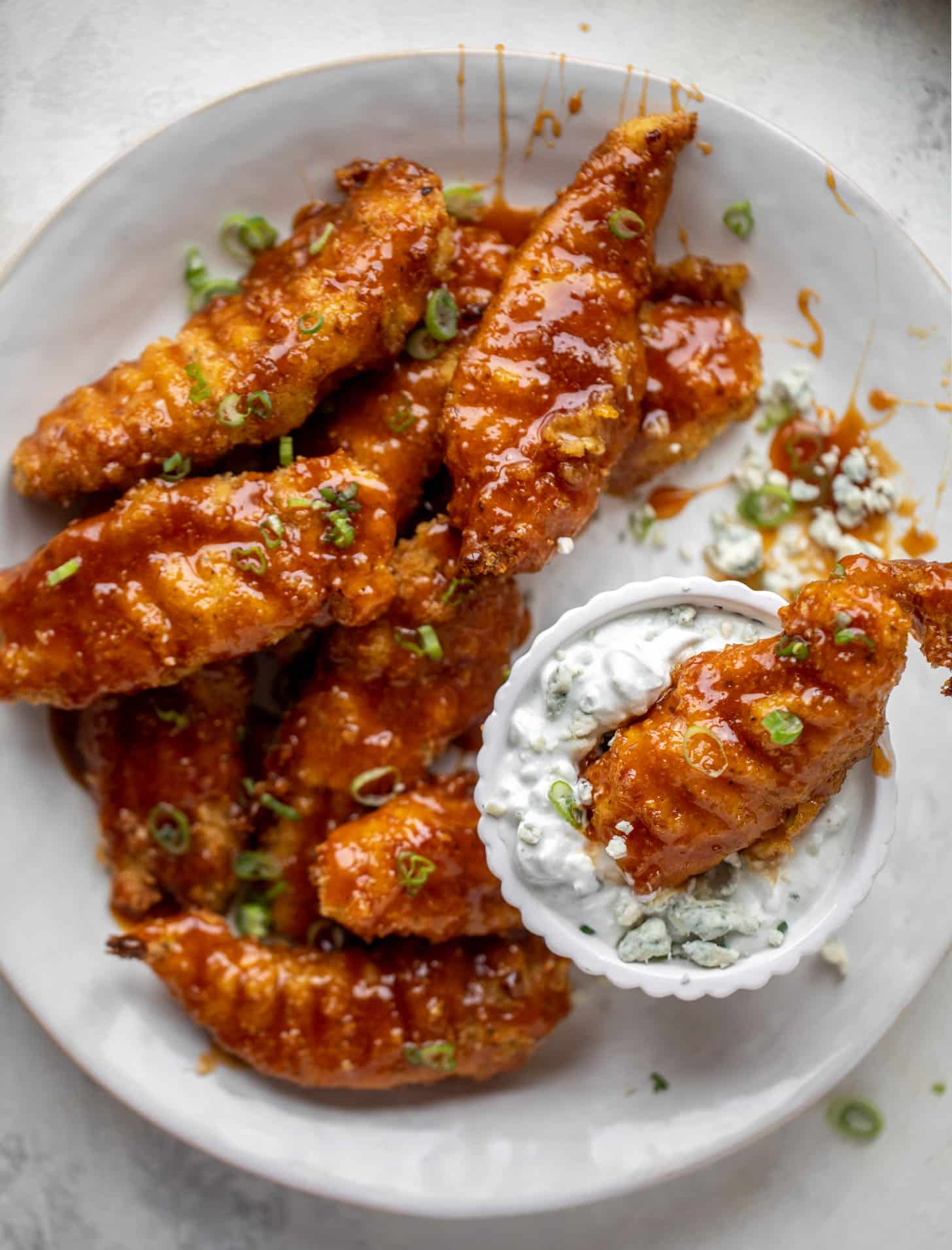 sticky chicken fingers with yogurt blue cheese sauce