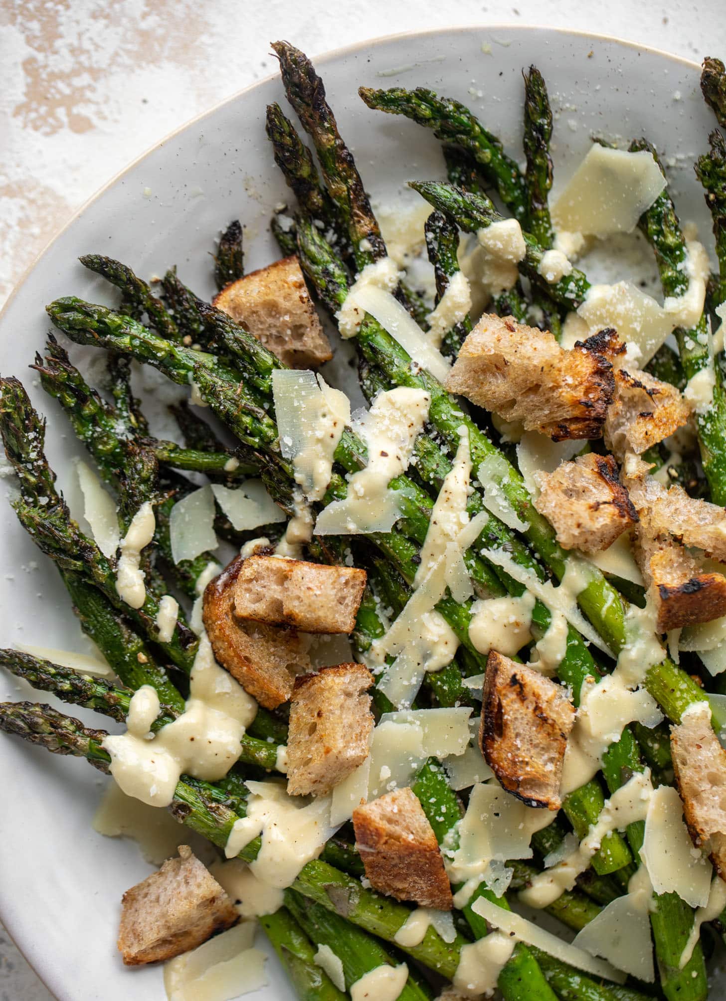 grilled asparagus caesar with sourdough croutons