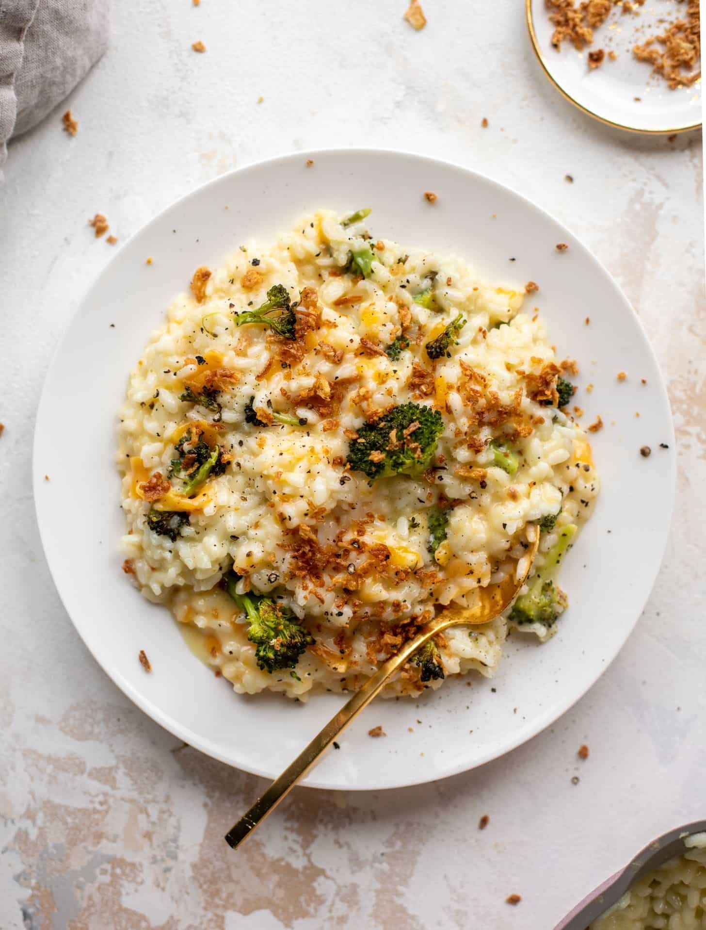 roasted broccoli cheddar risotto with crispy onions