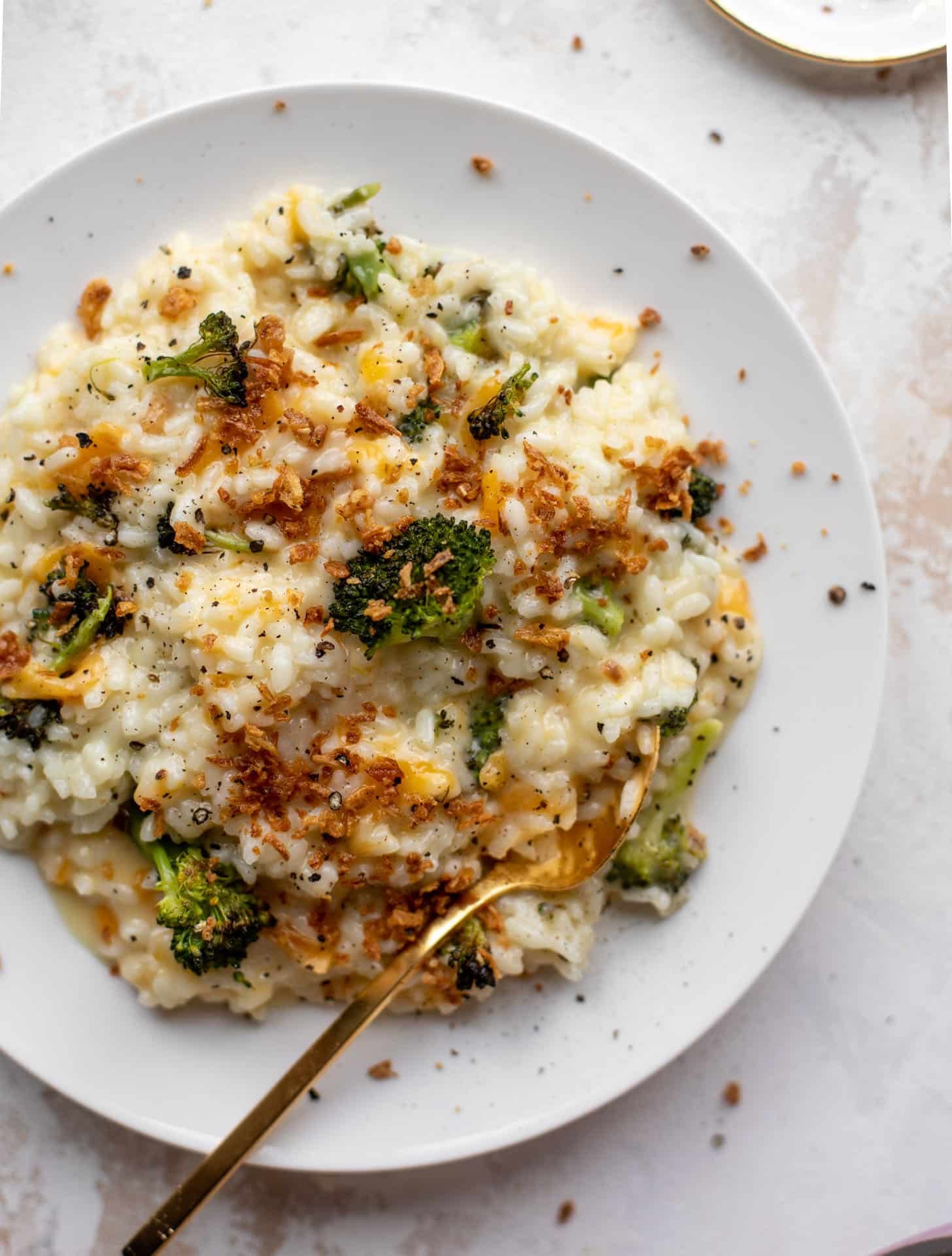 roasted broccoli cheddar risotto with crispy onions