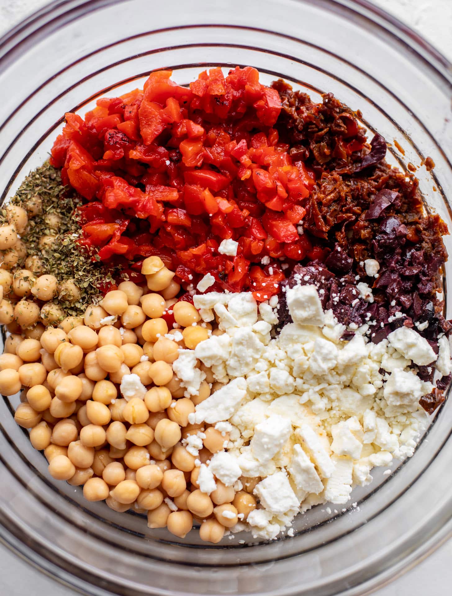 roasted red peppers, sun dried tomatoes, chickpeas, feta, spices
