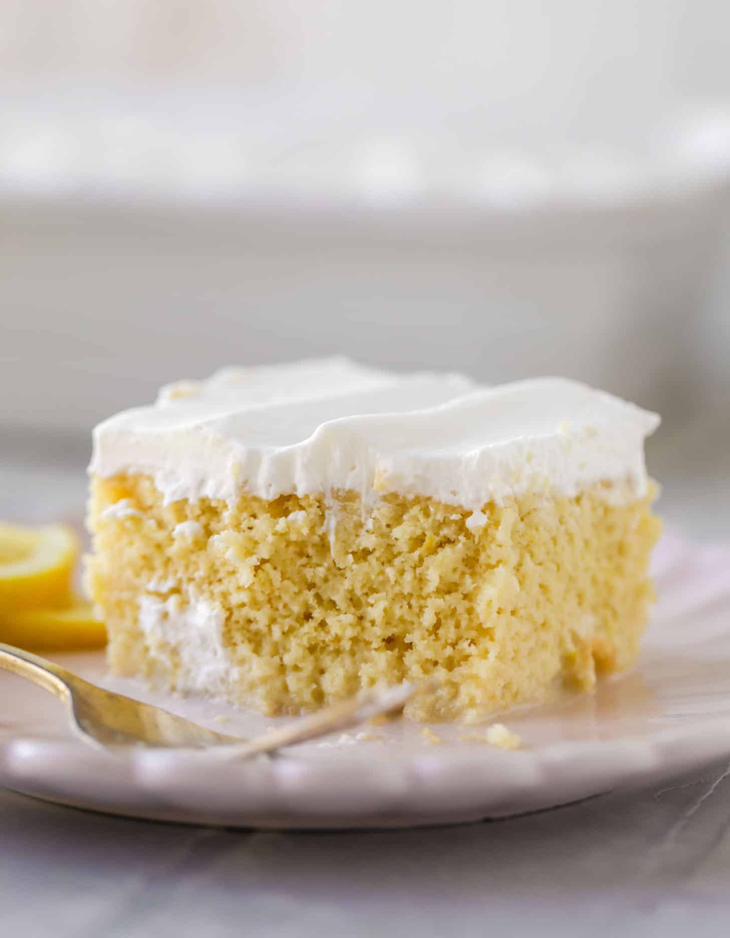 simple lemon tres leches cake with whipped cream