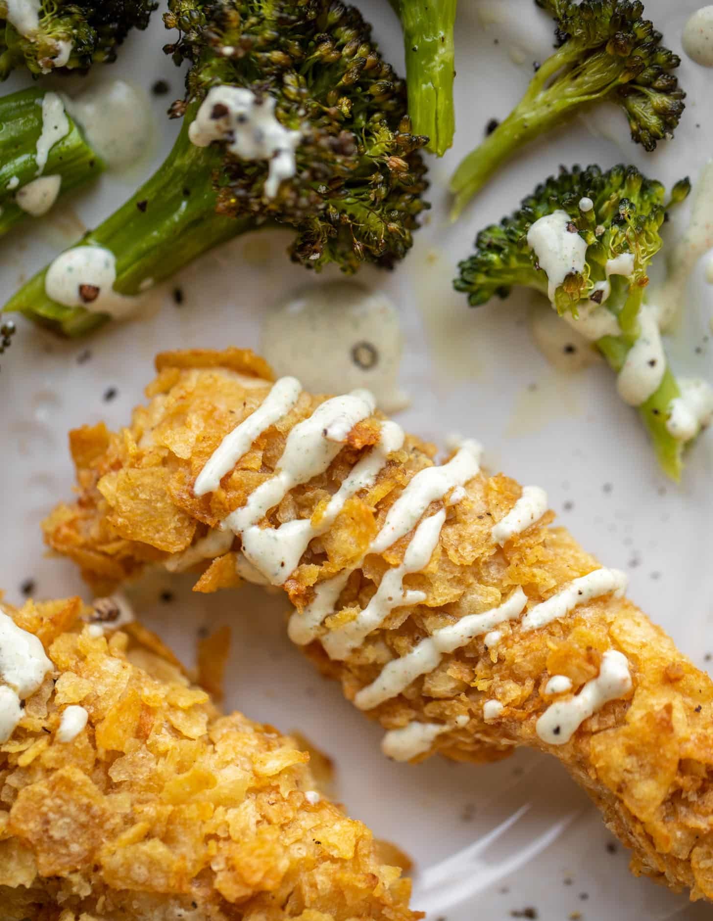 potato chip crusted chicken fingers with ranch and roasted broccoli