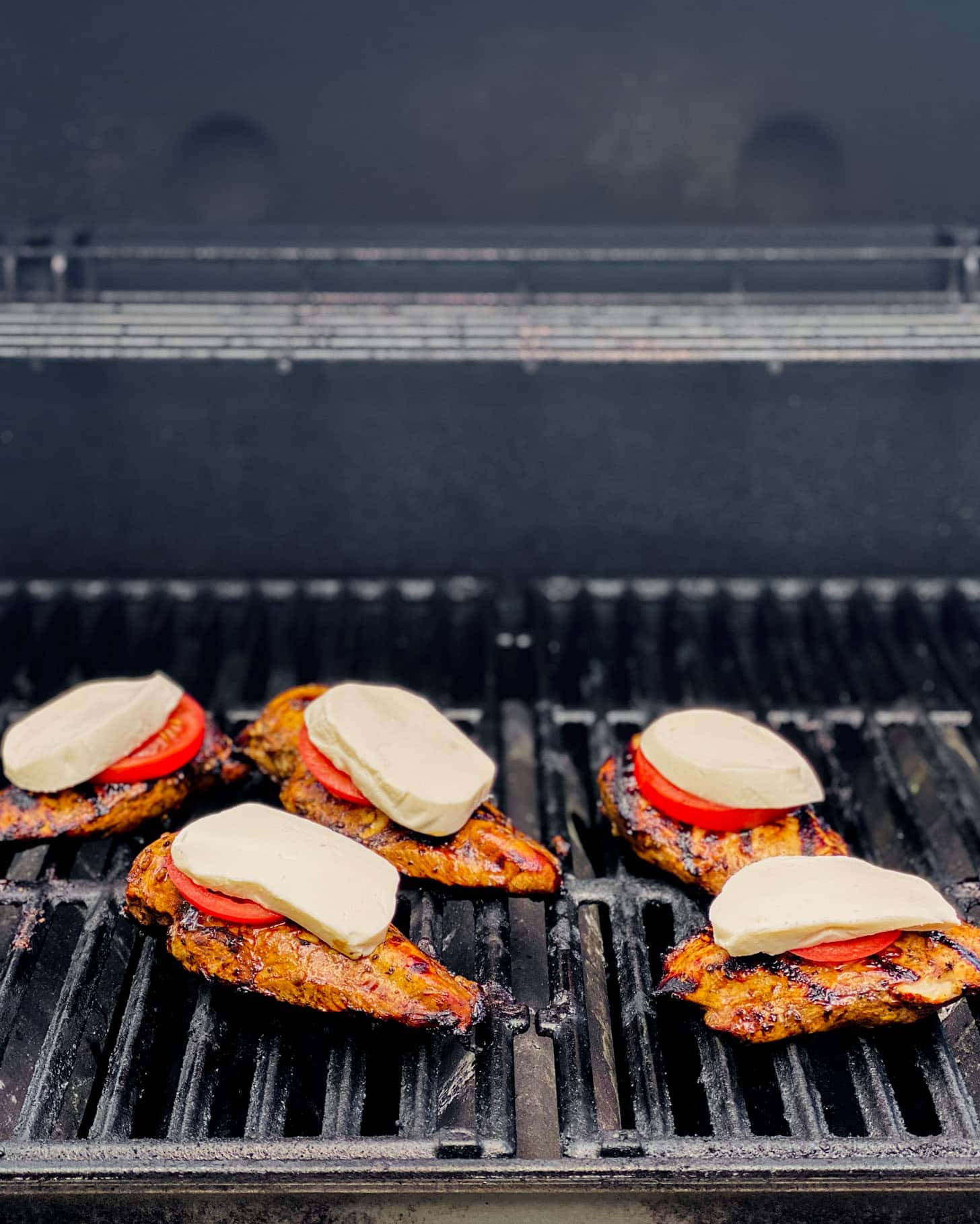 grilling the chicken parmesan