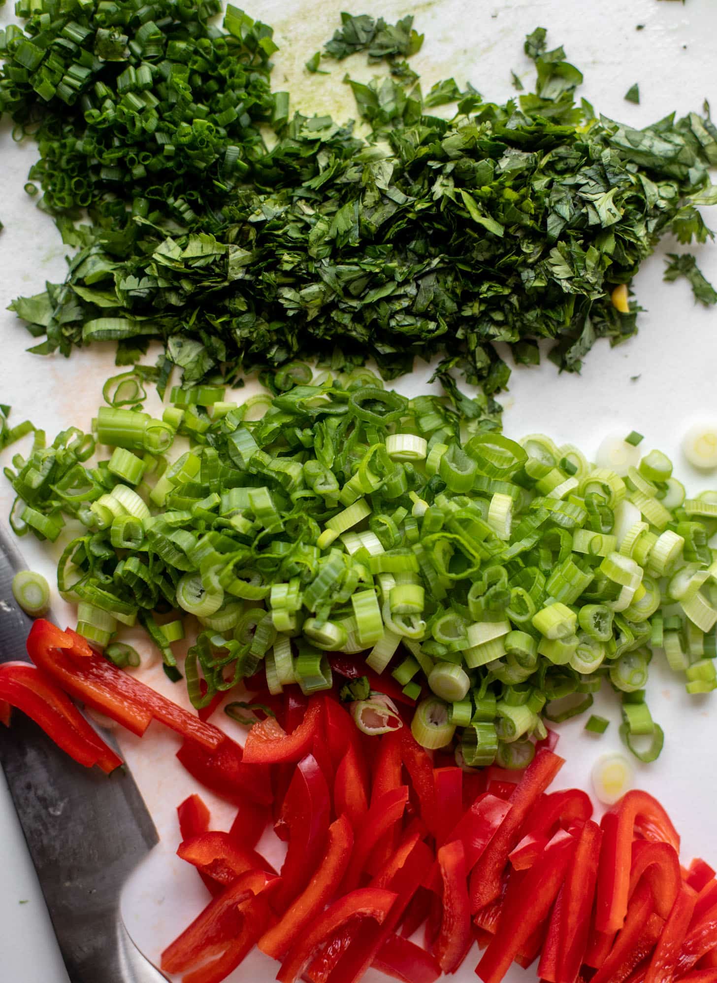 red peppers, scallions and fresh herbs