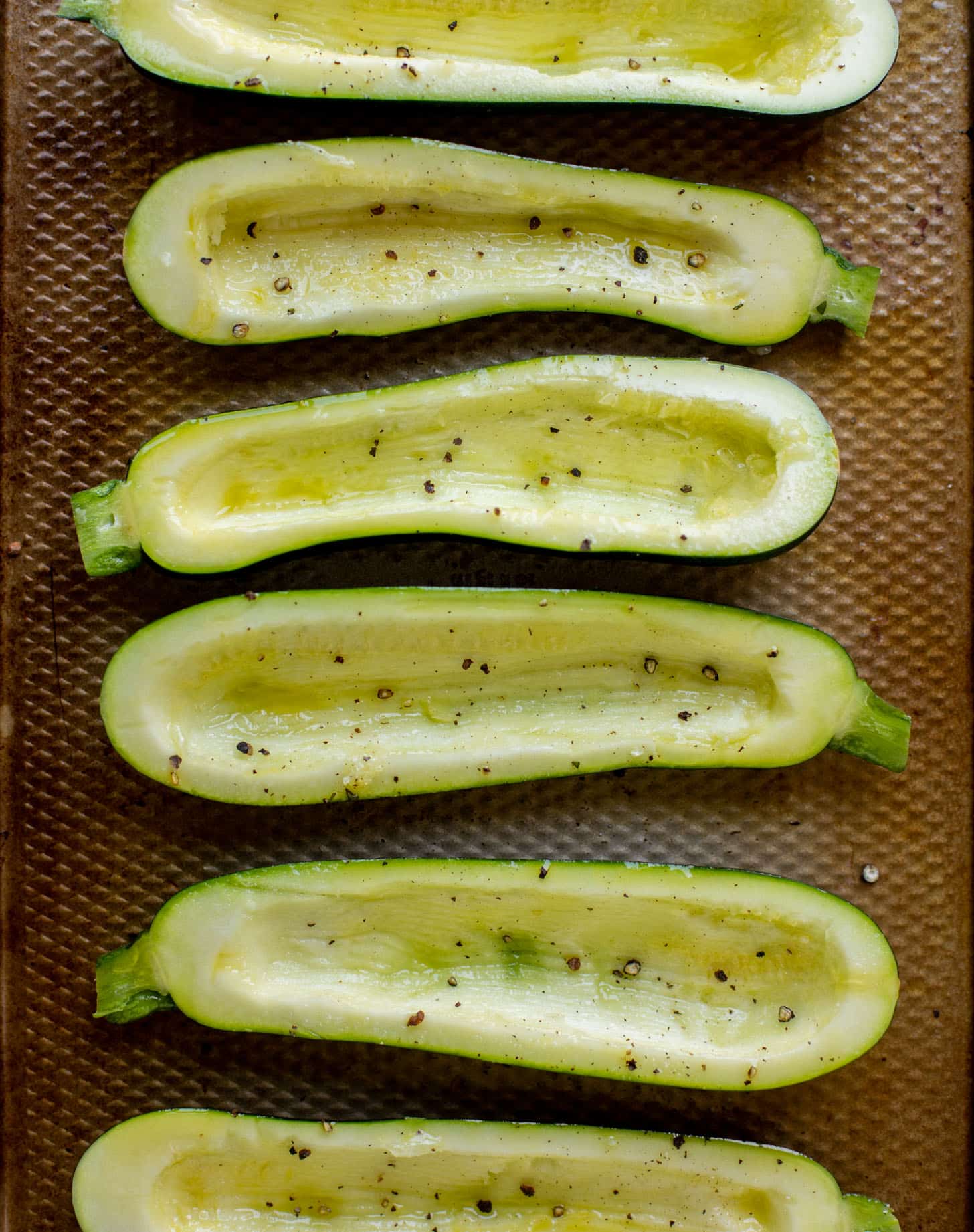 sliced zucchini with salt and pepper