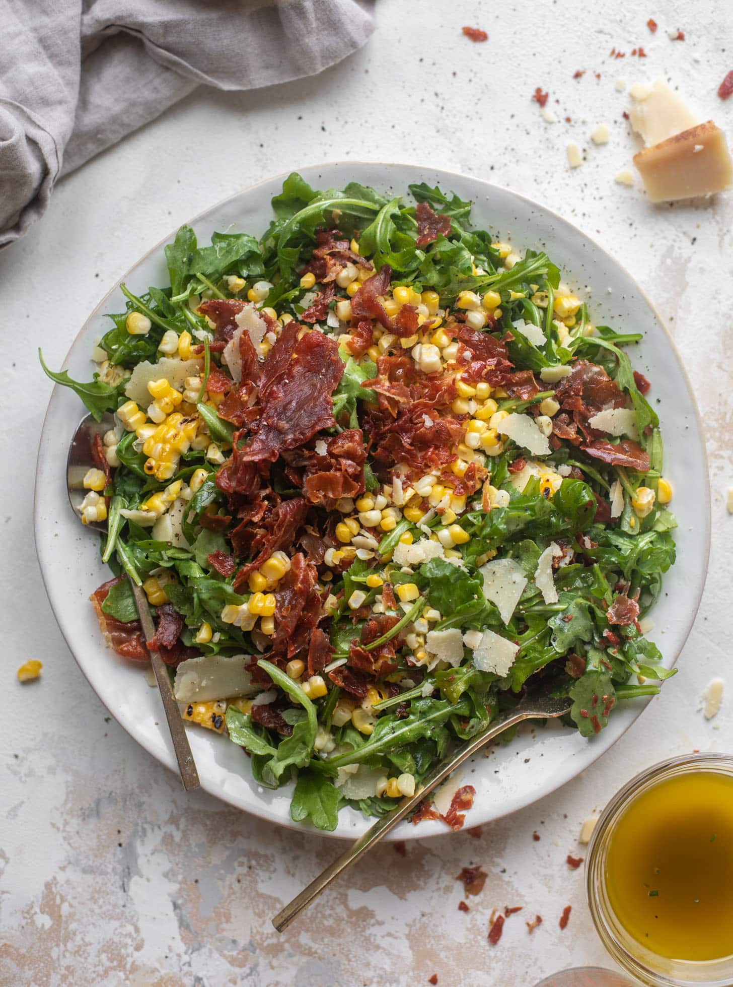 crispy prosciutto & charred corn arugula salad