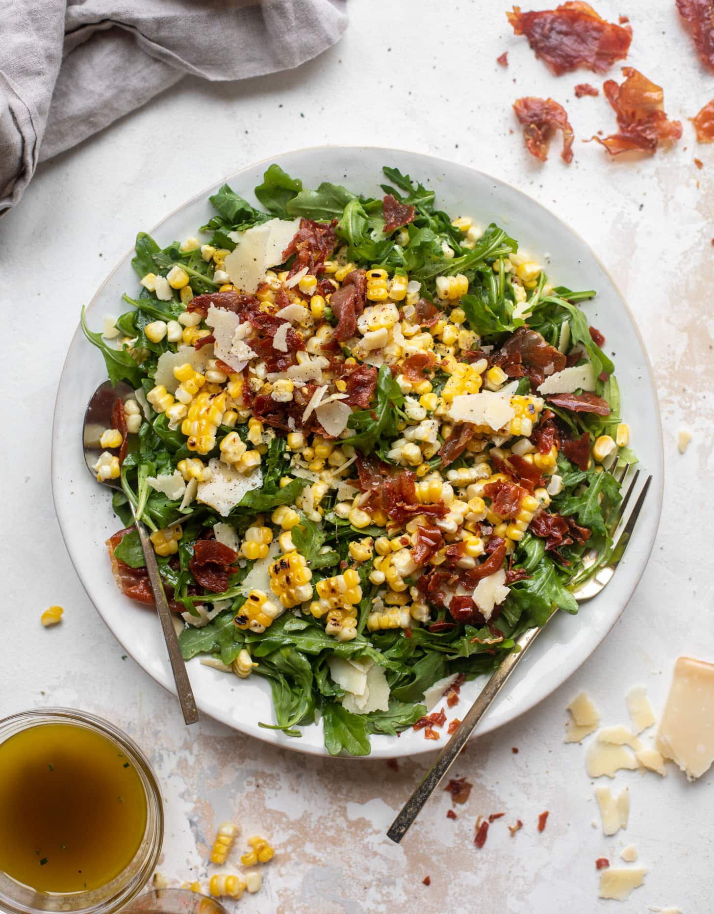 crispy prosciutto & charred corn arugula salad