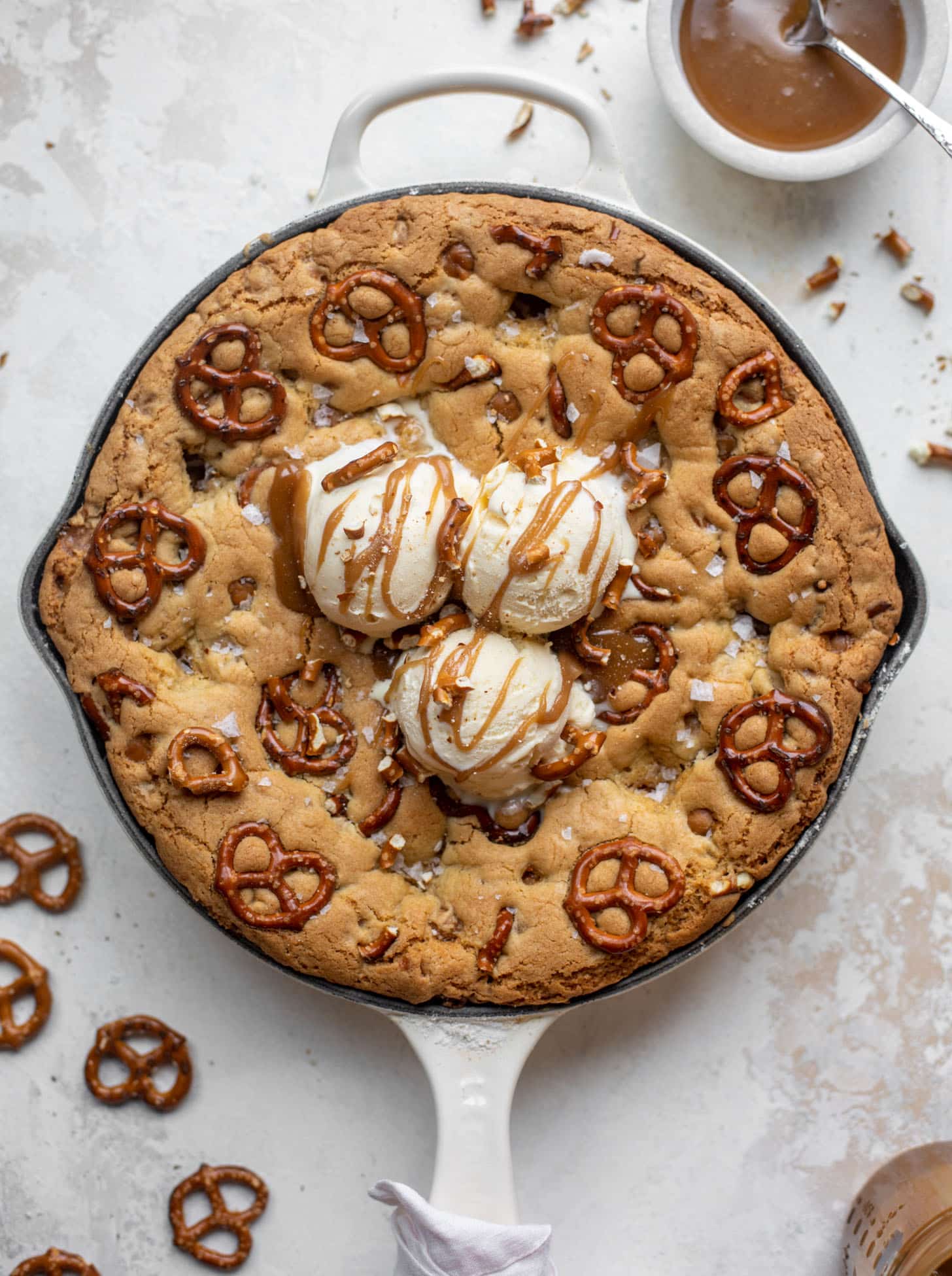 caramel pretzel skillet cookie with ice cream