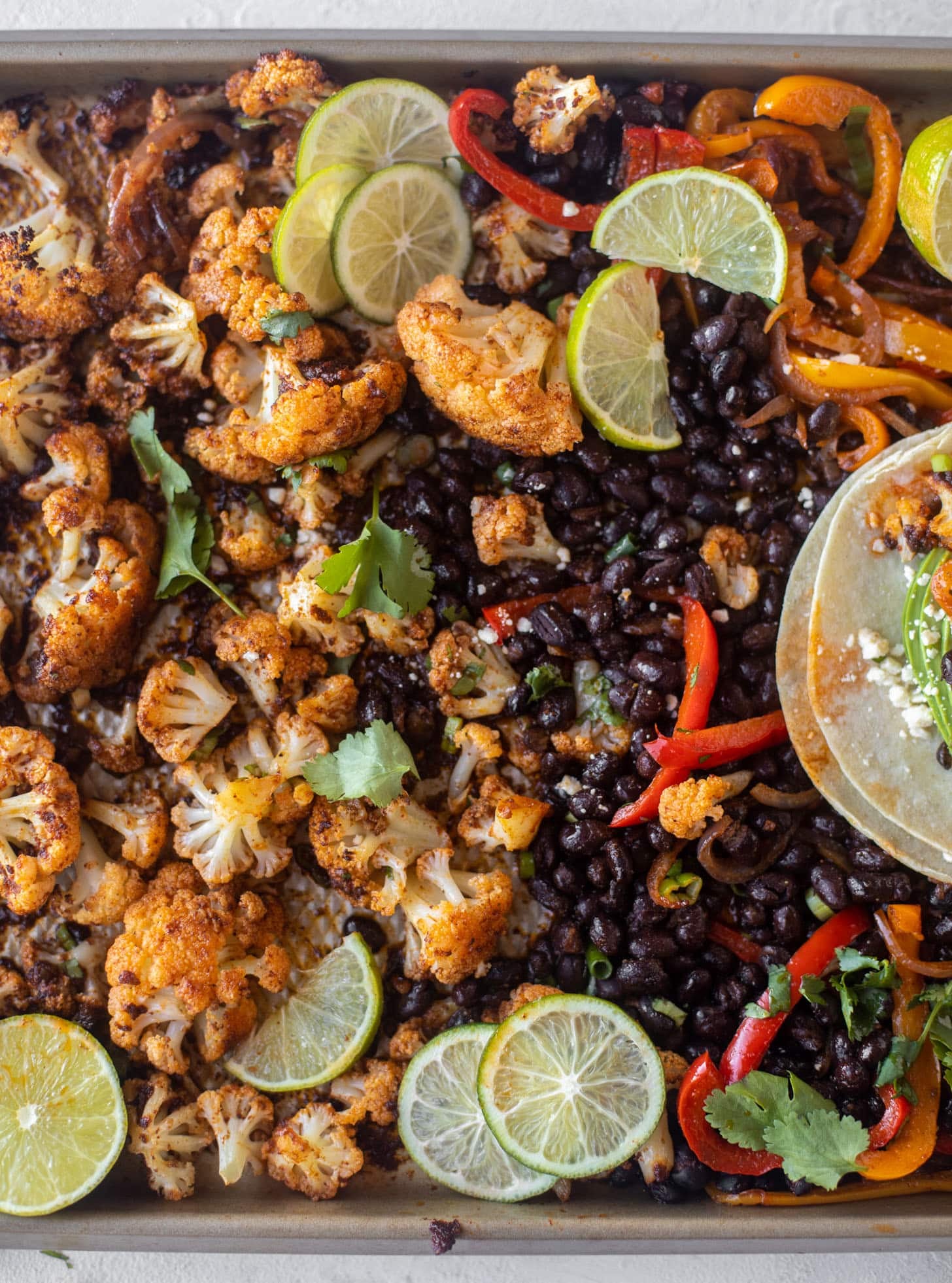 cauliflower and black bean sheet pan fajitas