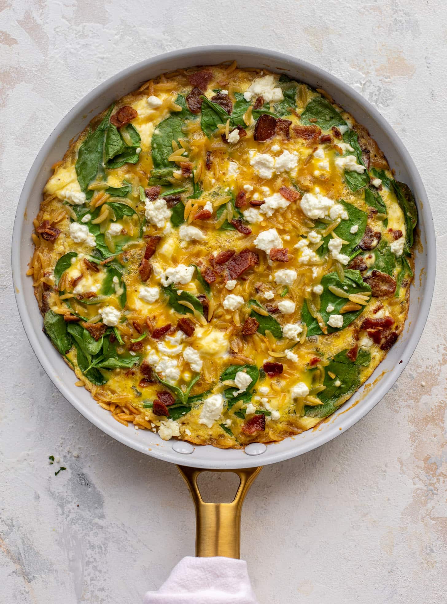 crispy orzo frittata with bacon and goat cheese