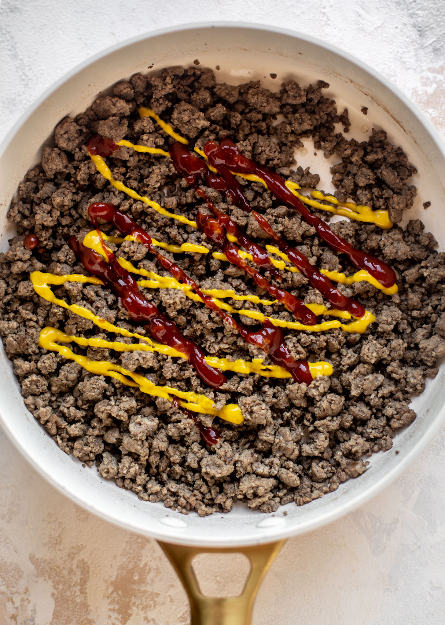 ground beef with ketchup and mustard