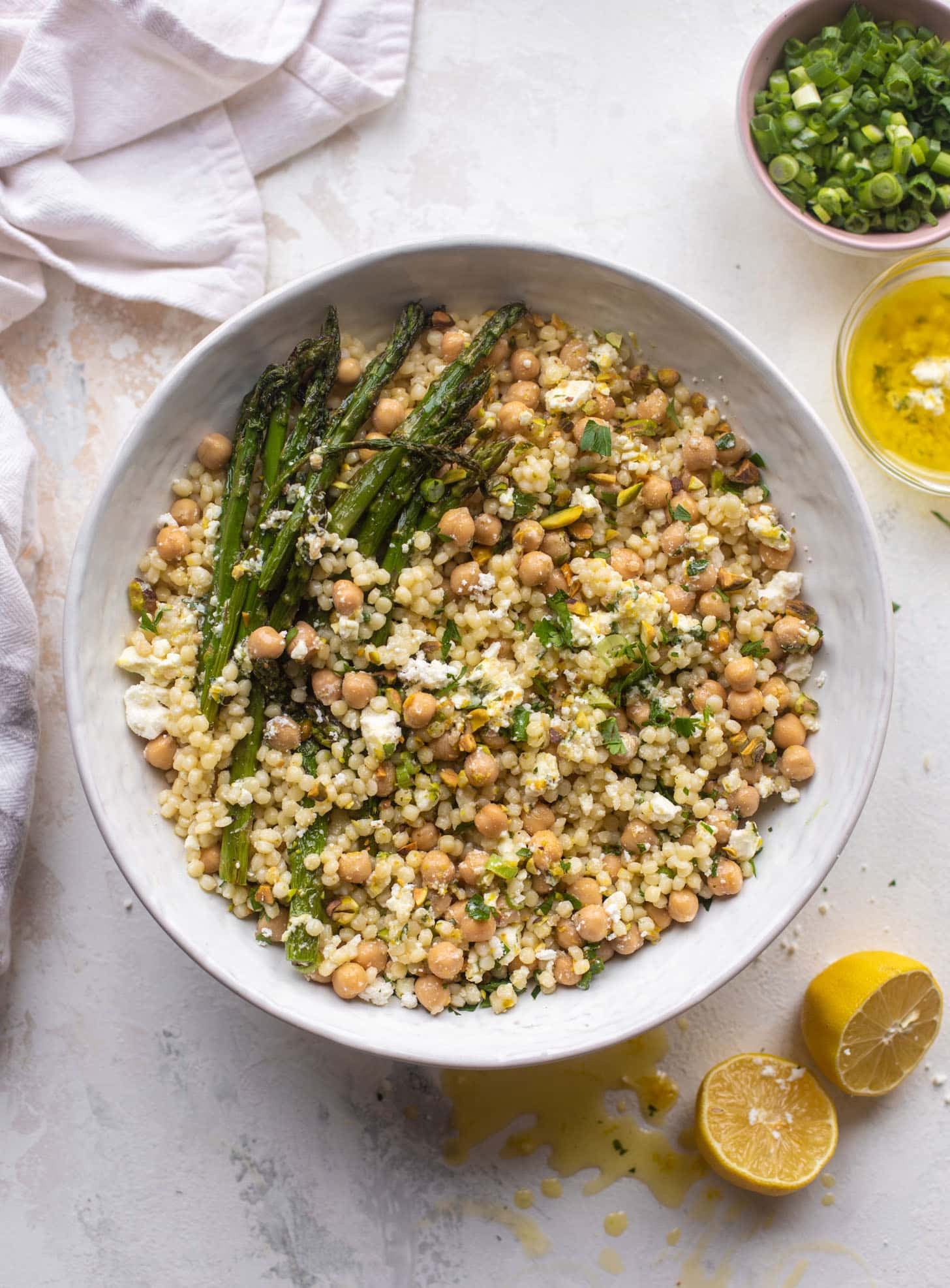 spring couscous bowls with lemon feta vinaigrette