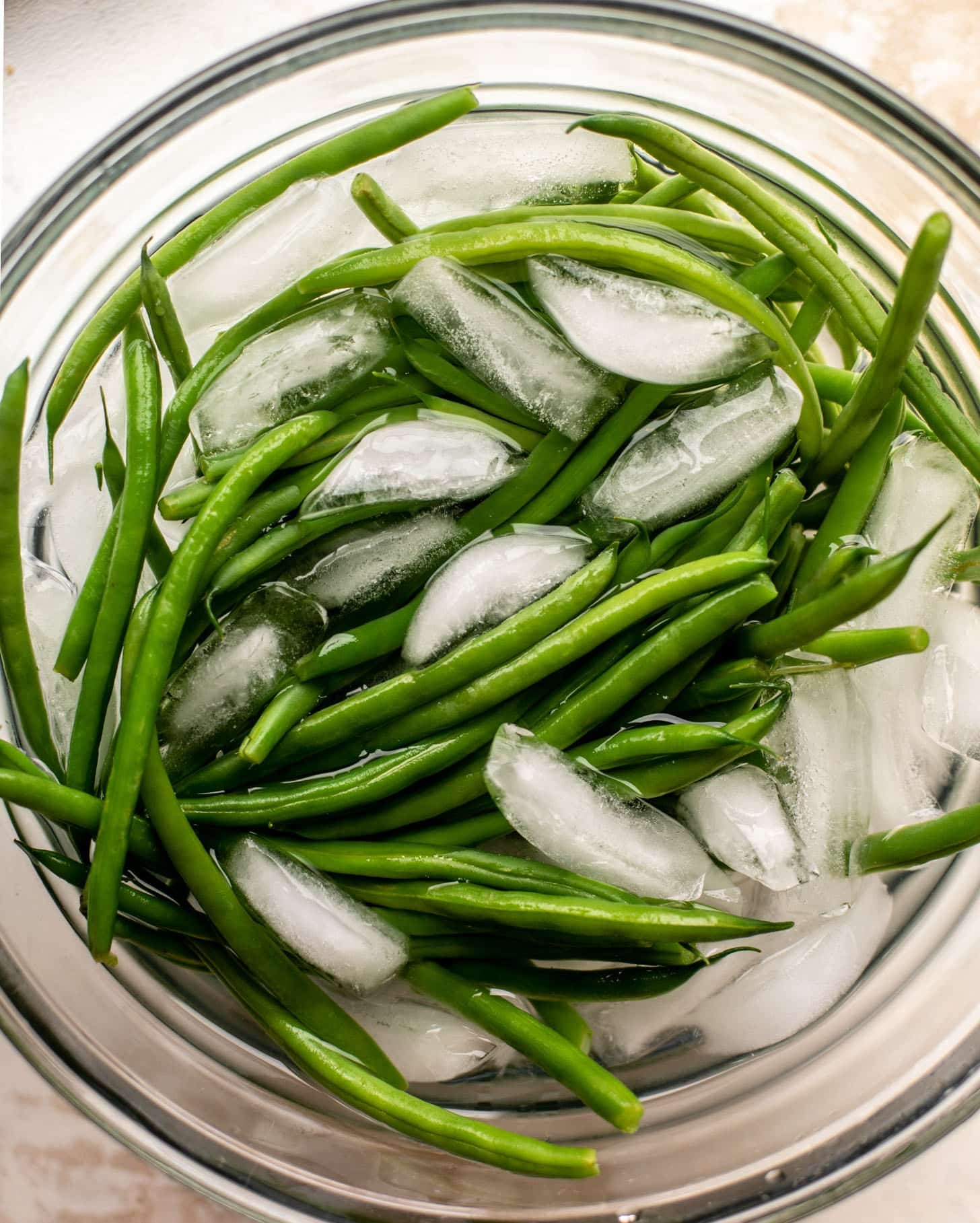 green beans in an ice bath