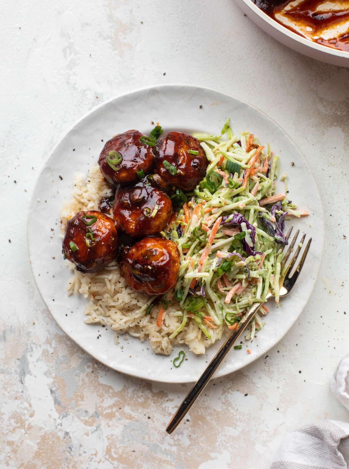 sticky BBQ chicken meatballs with broccoli slaw