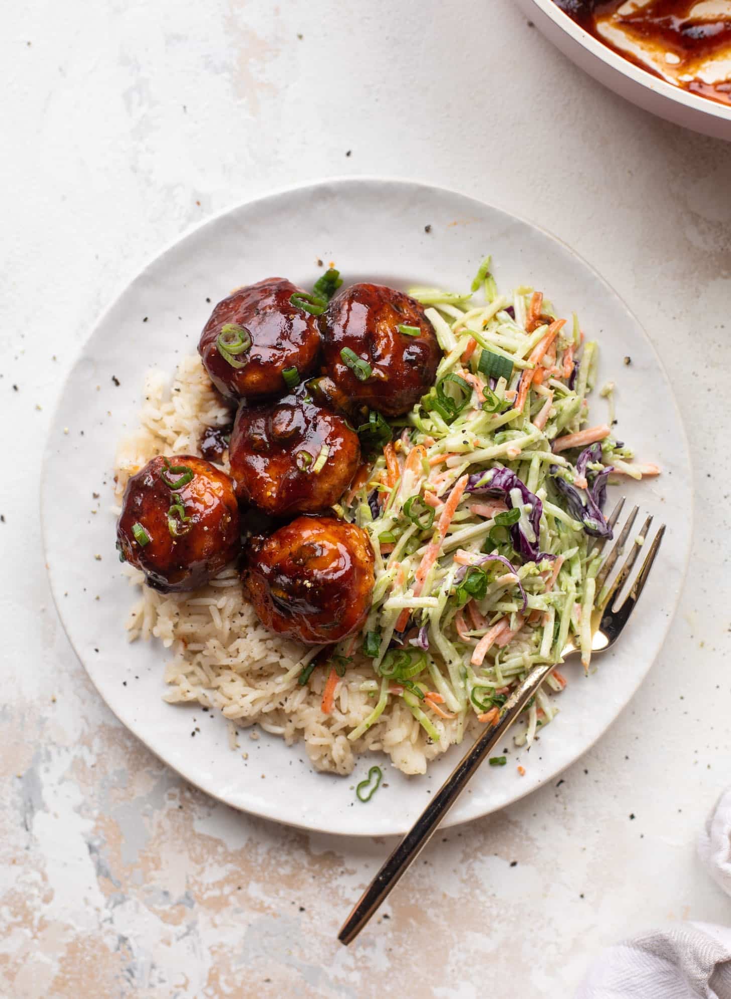 sticky BBQ chicken meatballs with broccoli slaw