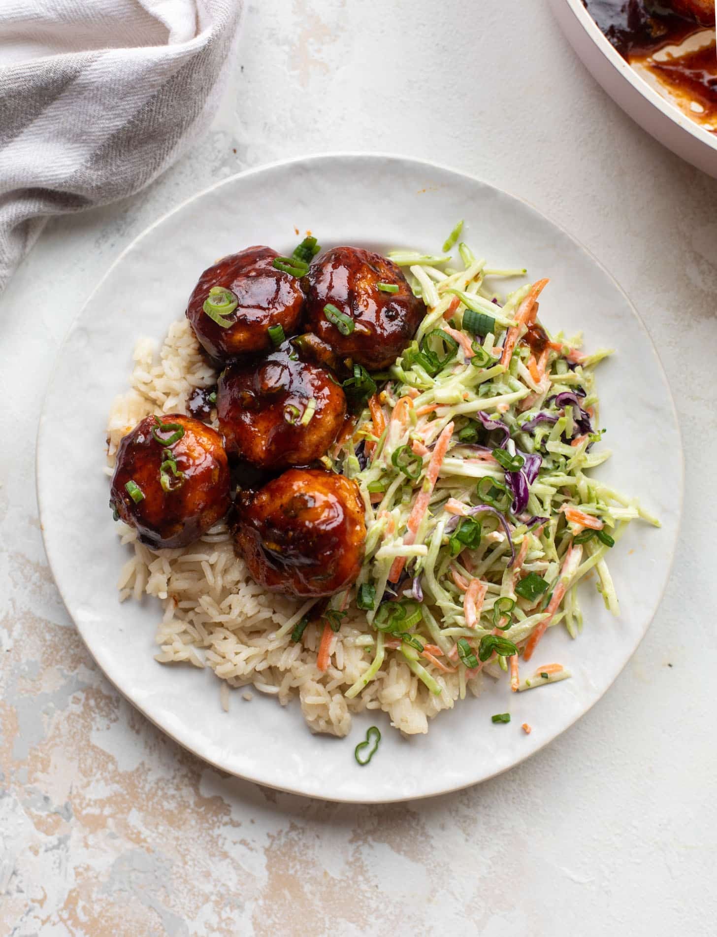 sticky BBQ chicken meatballs with broccoli slaw