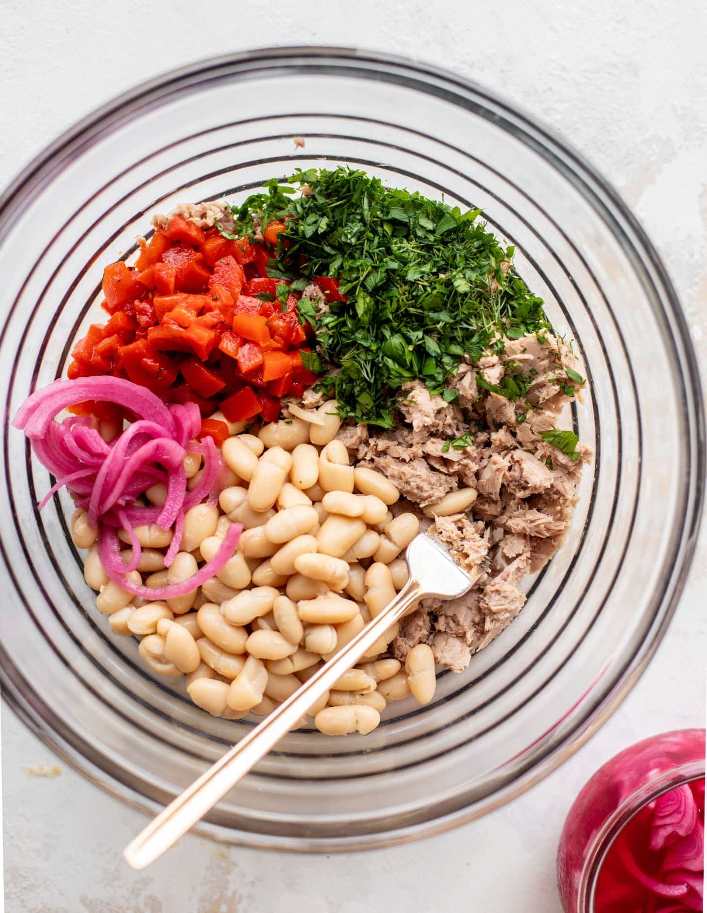 white beans, pickled onions, herbs, roasted red peppers, tuna