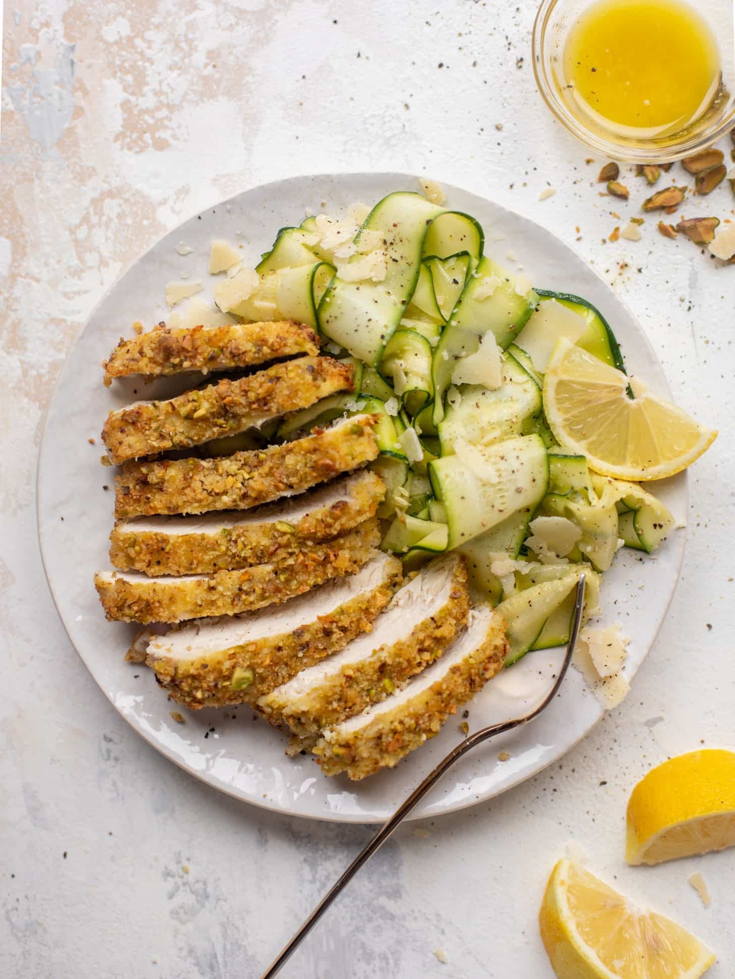 pistachio crusted chicken with zucchini ribbon salad