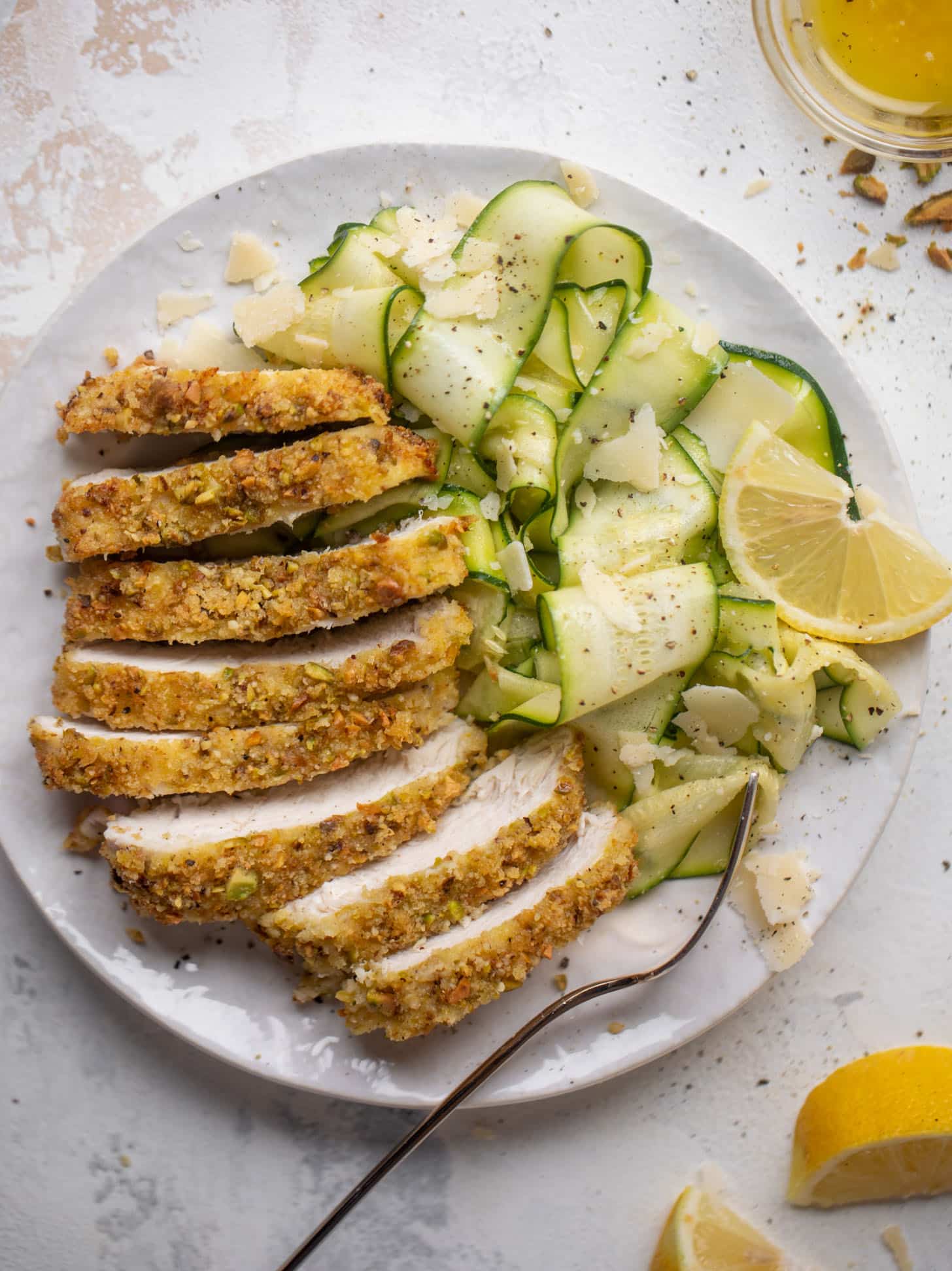 pistachio crusted chicken with zucchini ribbon salad