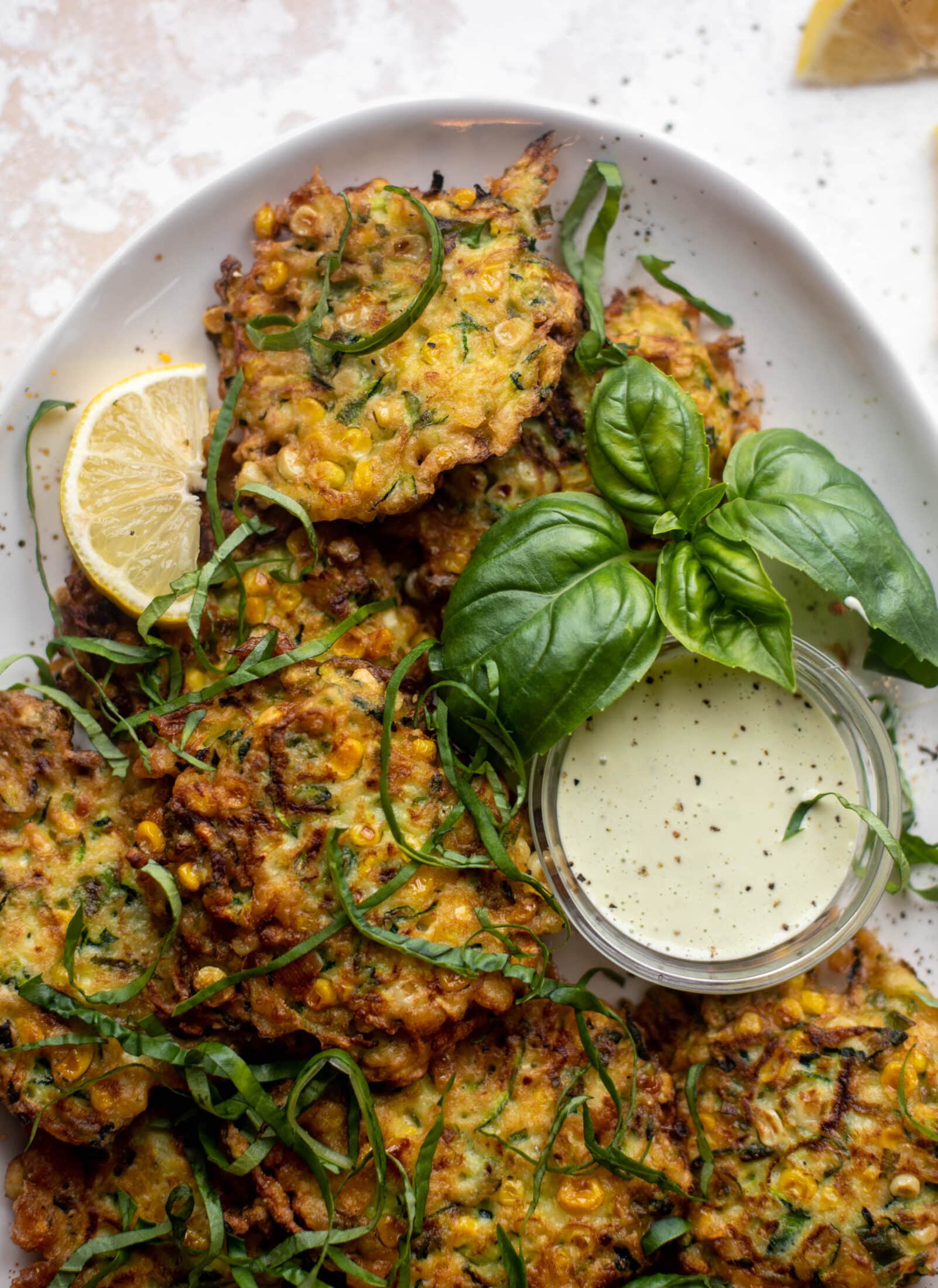 zucchini corn fritters with lemon basil aioli