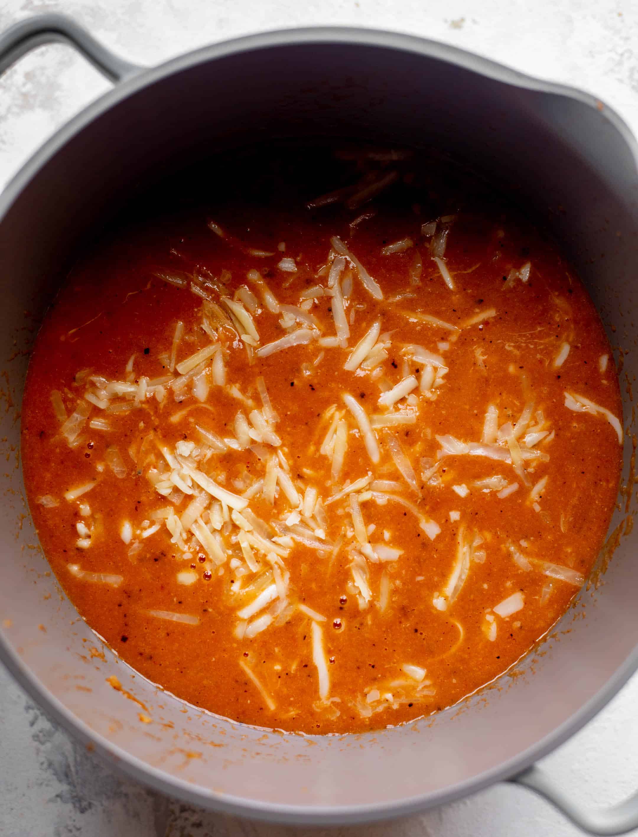 tortilla soup base with cheese