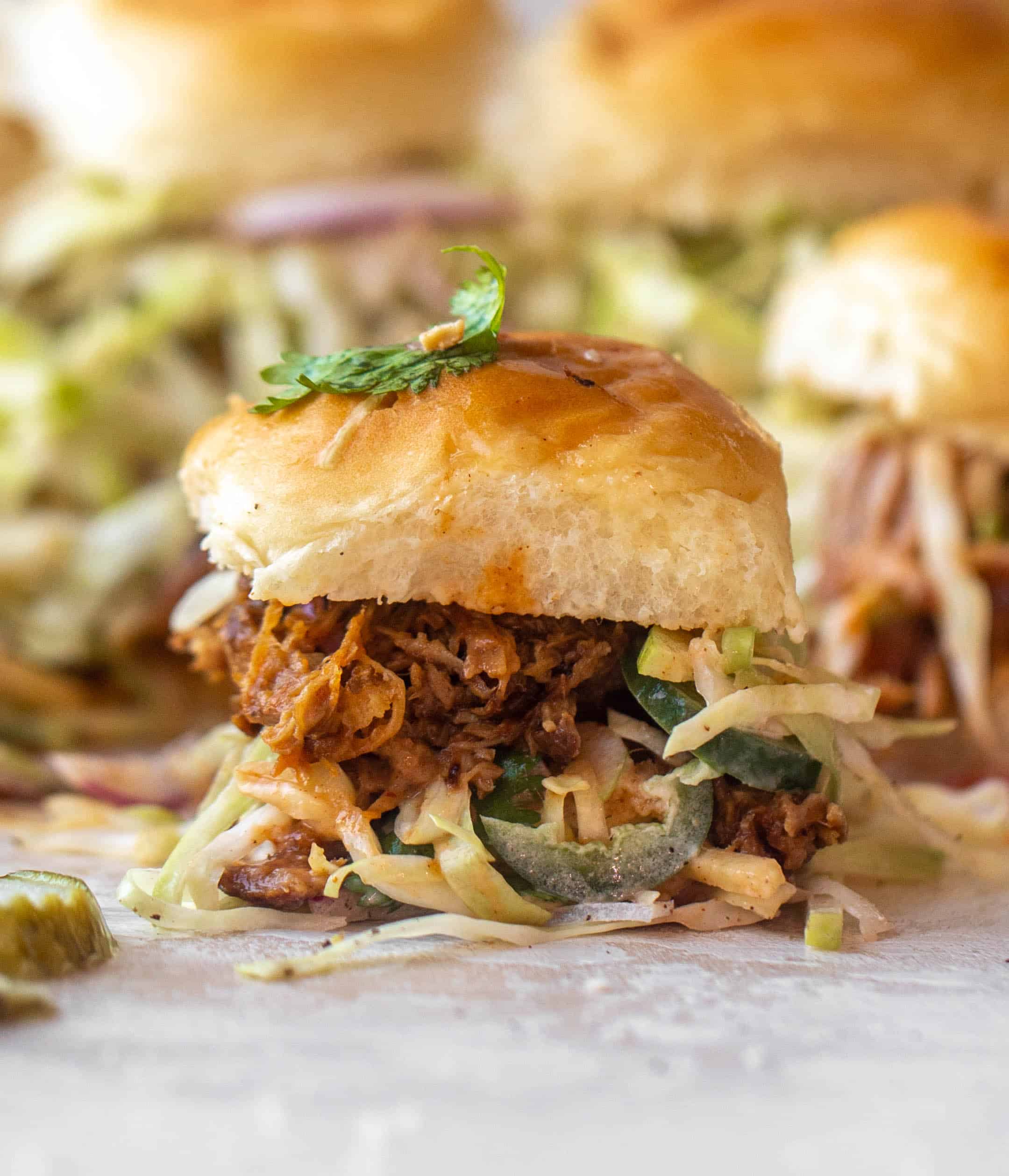 root beer pulled pork sliders with jalapeño slaw