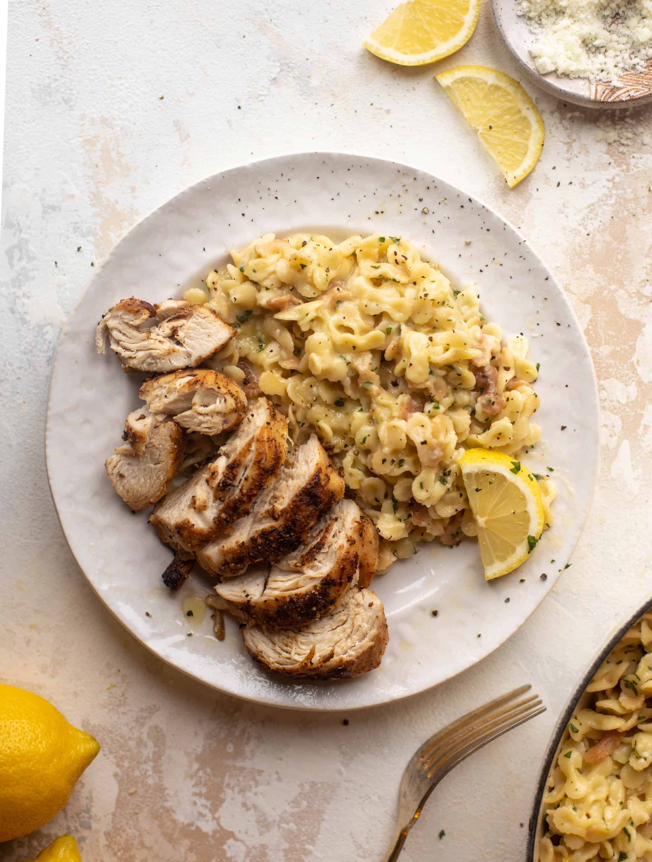 seared cast iron chicken with baked lemon pasta